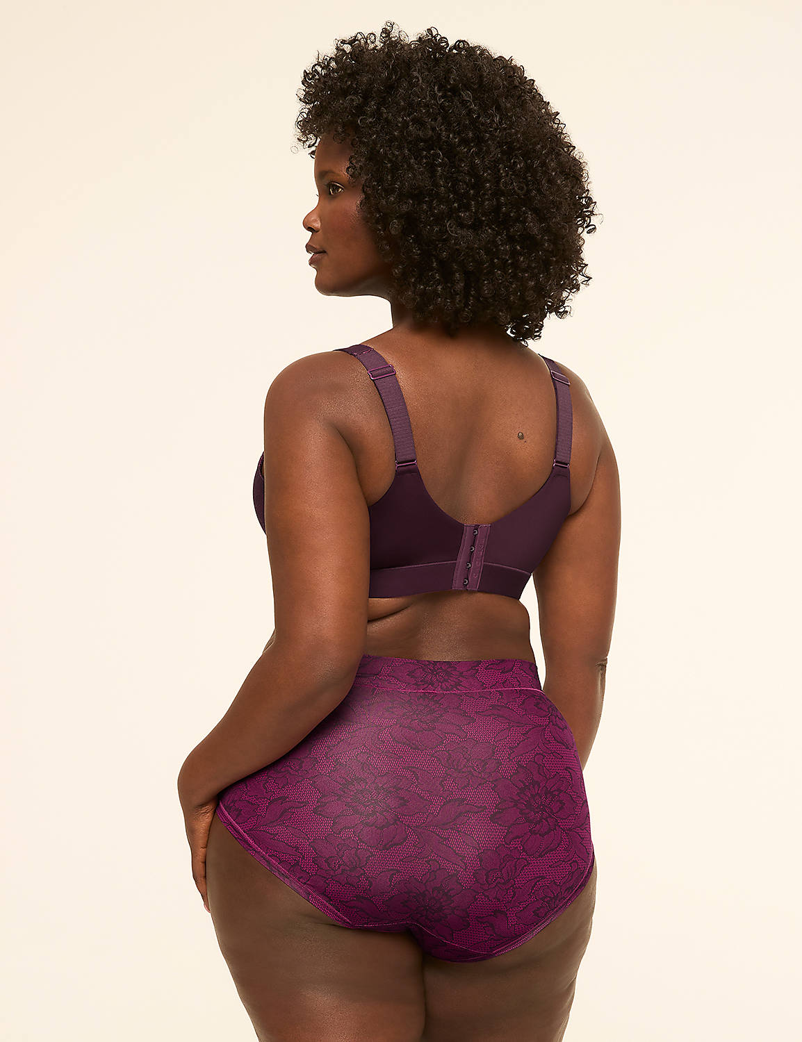 A woman in a purple bra and patterned underwear stands against a plain, light background. Product Image 2