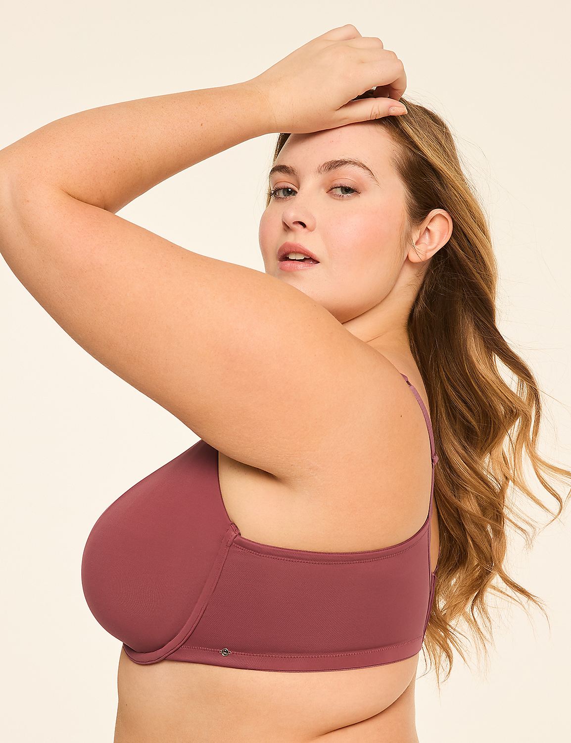 A woman in a mauve bra poses with her arm raised against a plain, light-colored background. Product Image 3