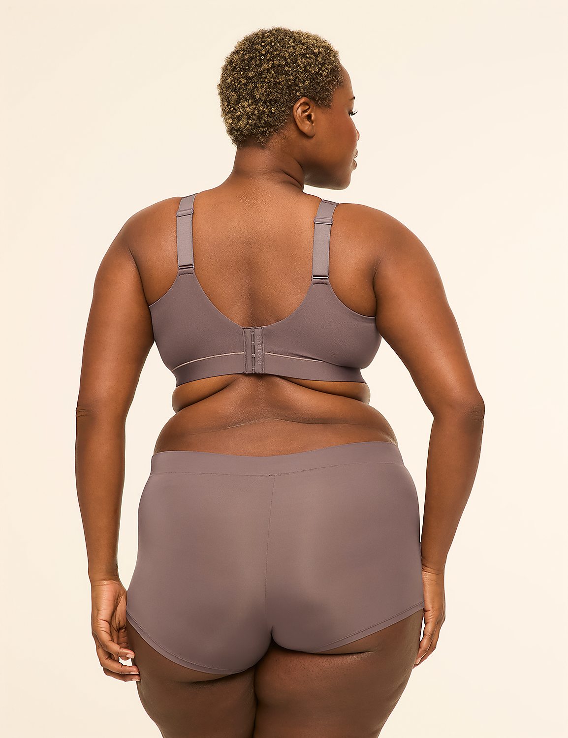 A woman in a grey bra and underwear stands facing away from the camera against a plain, light background. Product Image 2