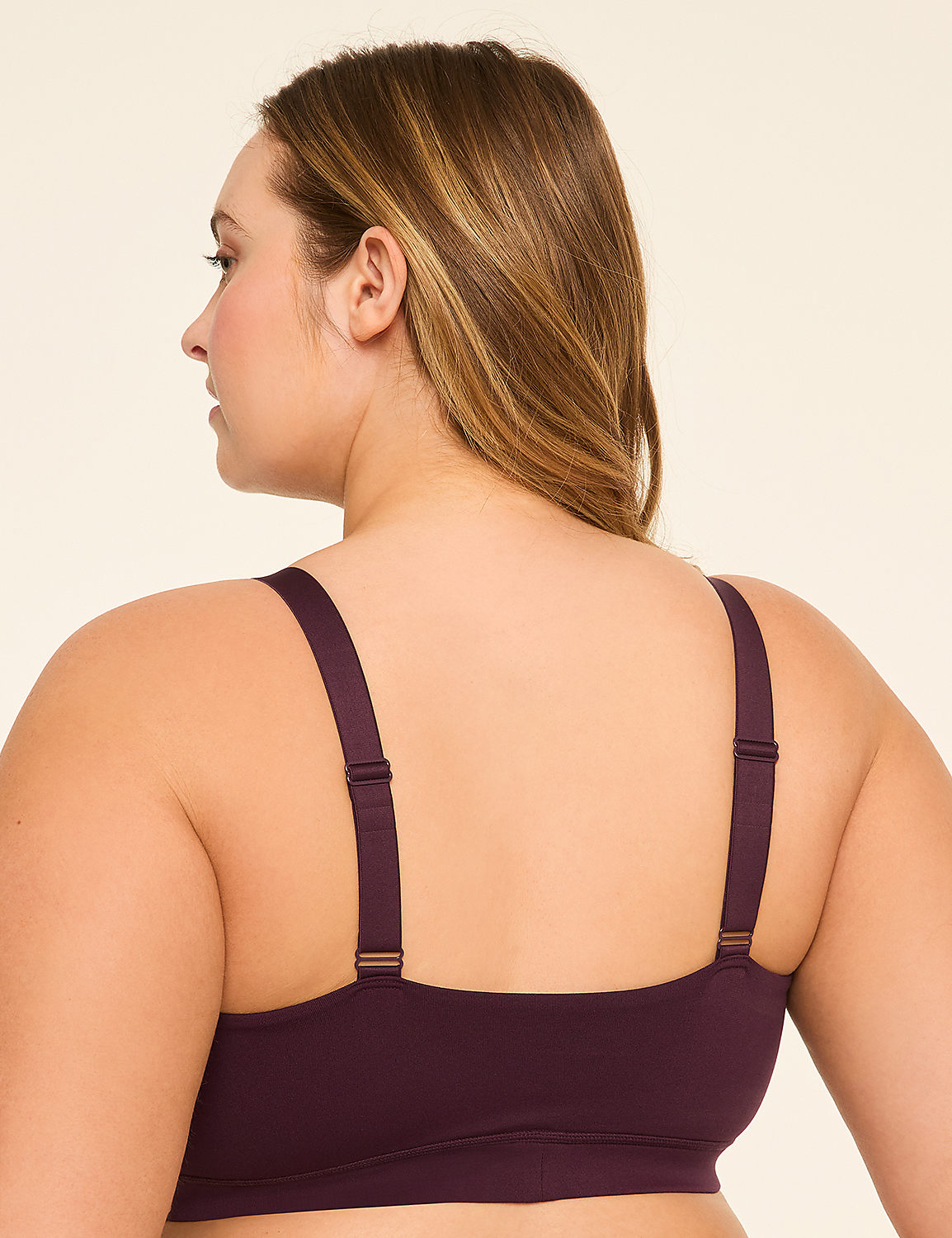 A woman's back, wearing a plum-colored bra, is shown against a plain, light-colored background. Product Image 2