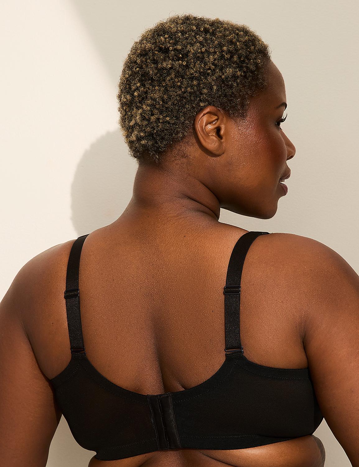 A woman with short, curly hair is shown from the back, wearing a black bra against a plain, light-colored background with a shadow cast on the wall. Product Image 3