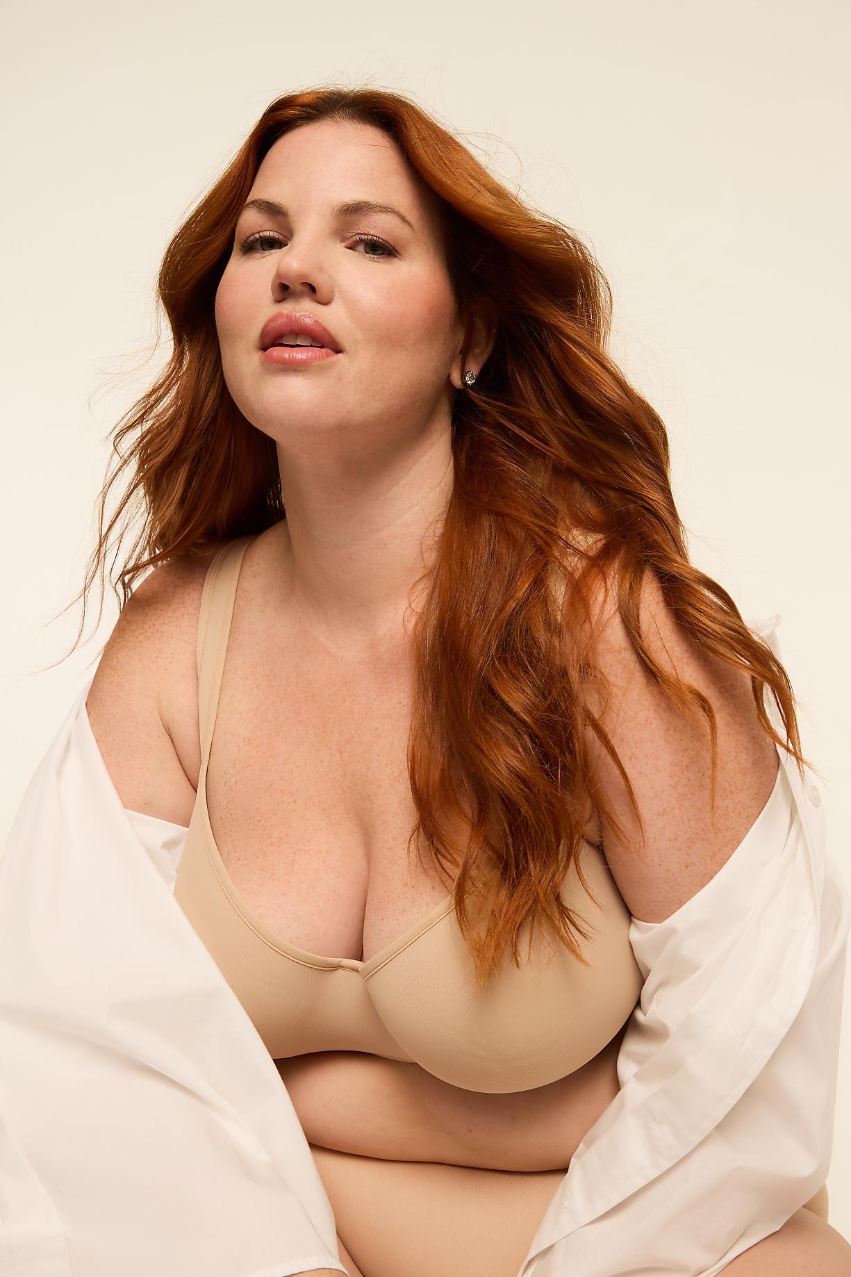 A woman with auburn hair and a tan bra is posed against a plain, light background. Product Image 12
