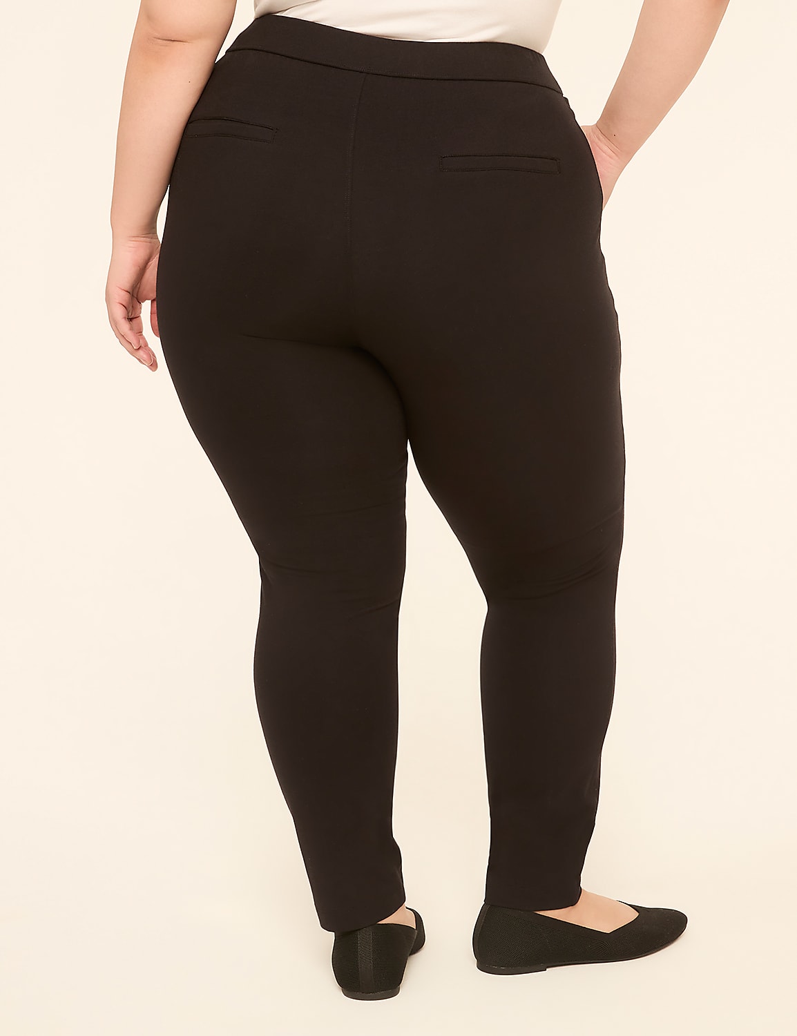 A person wearing black pants and black flats stands against a plain, light-colored background. Product Image 2