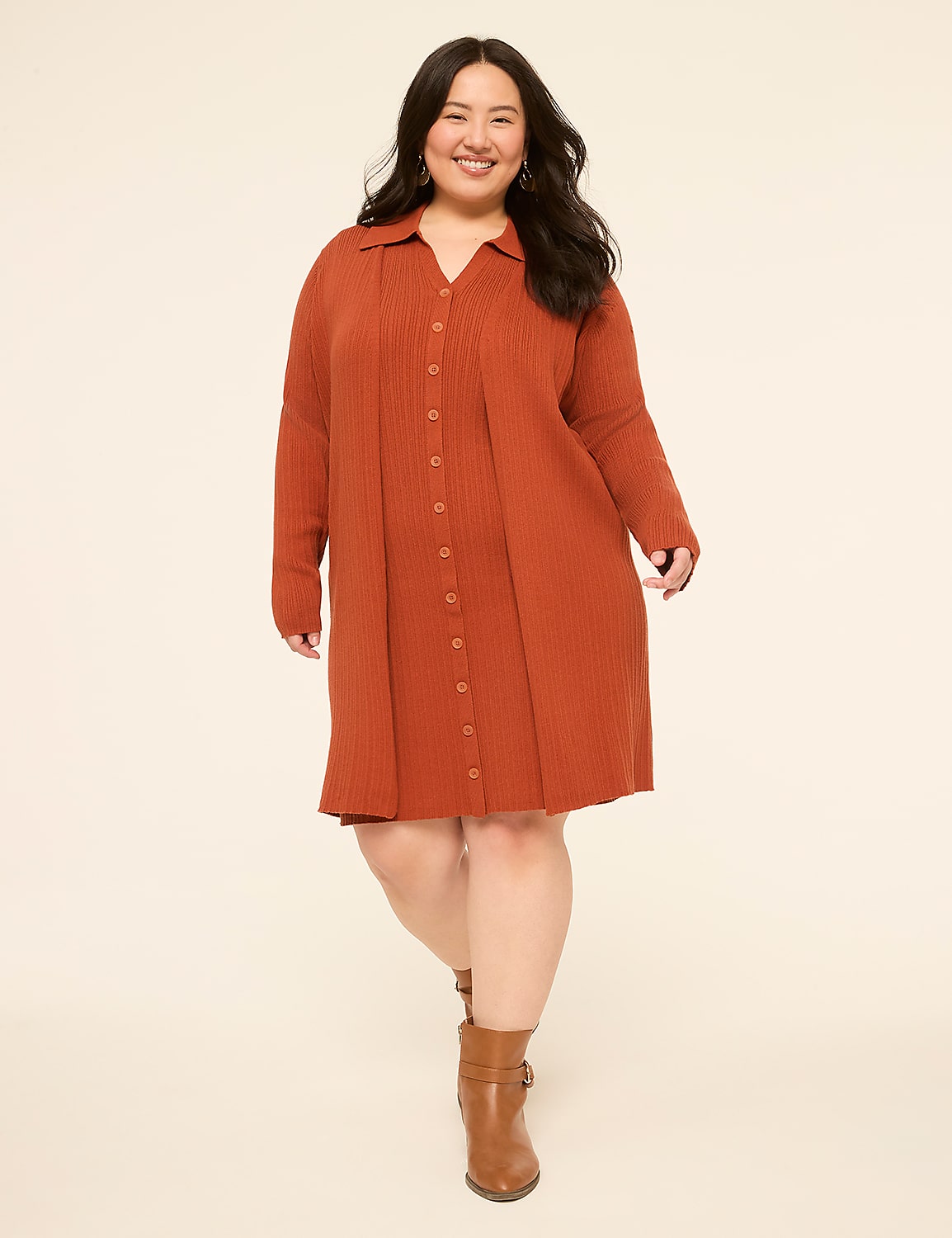 A smiling woman in a rust-colored button-down dress and brown boots stands against a plain, light-colored background. Product Image 4