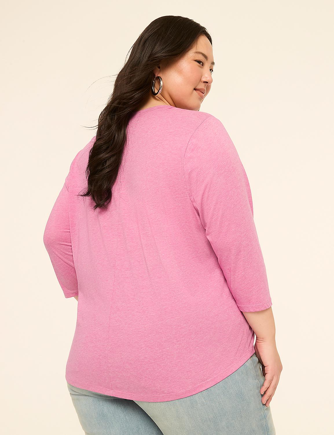 A woman in a pink shirt and jeans stands against a plain, light-colored background. Product Image 2