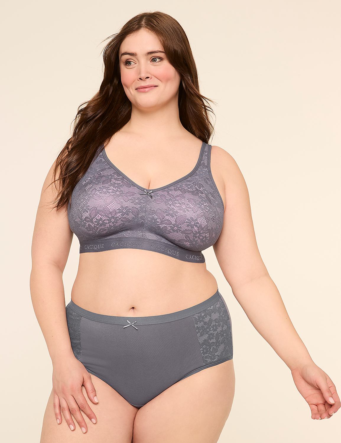 A woman in a grey lace bra and matching underwear stands against a plain, light-colored background. Product Image 4