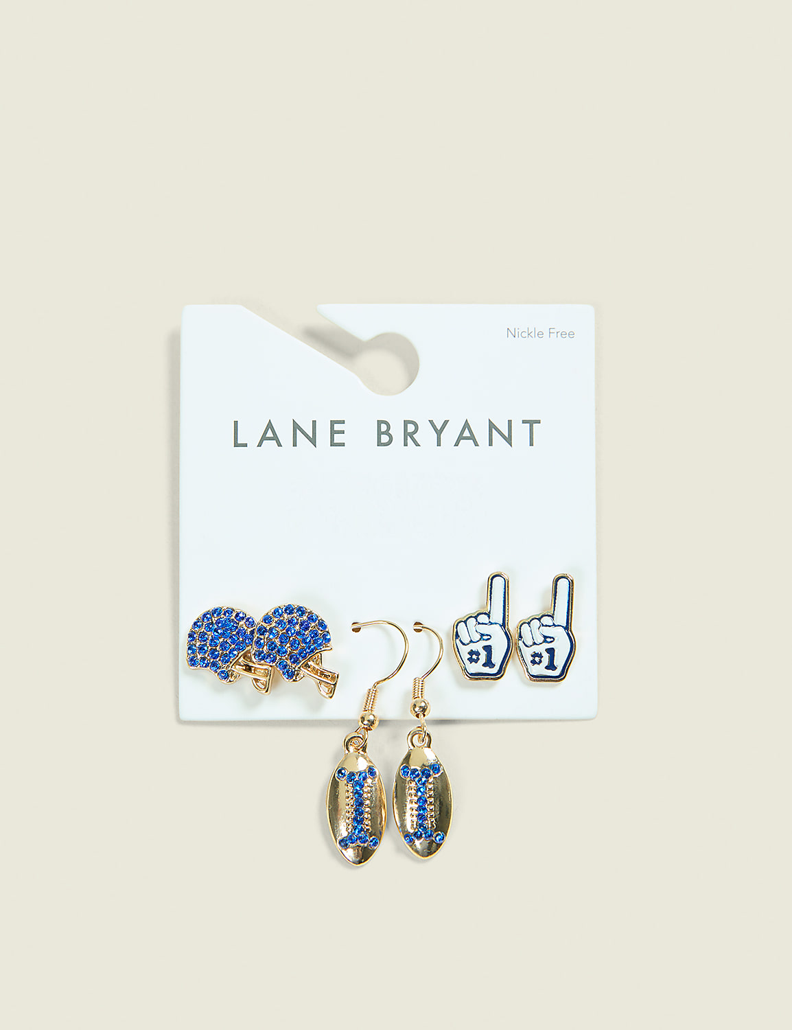 Three pairs of novelty earrings, including football helmets, foam fingers, and footballs, are displayed on a white card against a plain, light background. Product Image 1