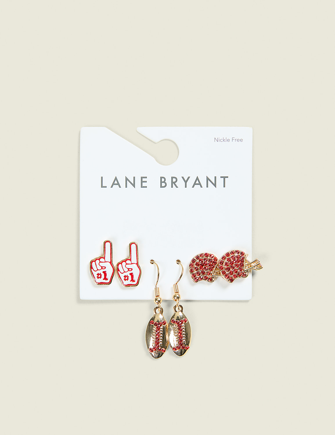 A set of three pairs of earrings, including foam fingers, bows, and baseballs, are displayed on a white card against a pale green background. Product Image 1