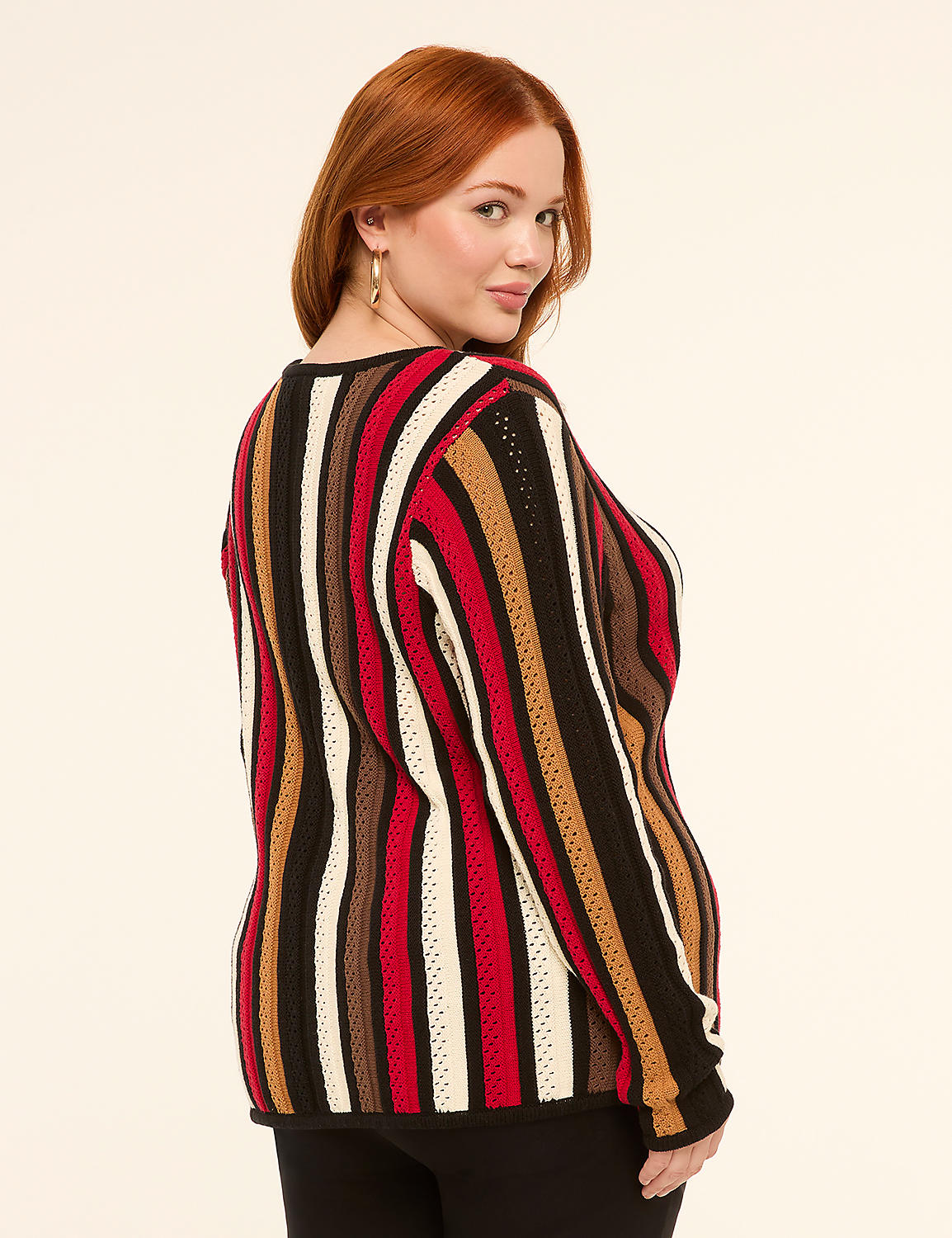 A woman with red hair wearing a striped sweater is shown against a plain, light-colored background. Product Image 2