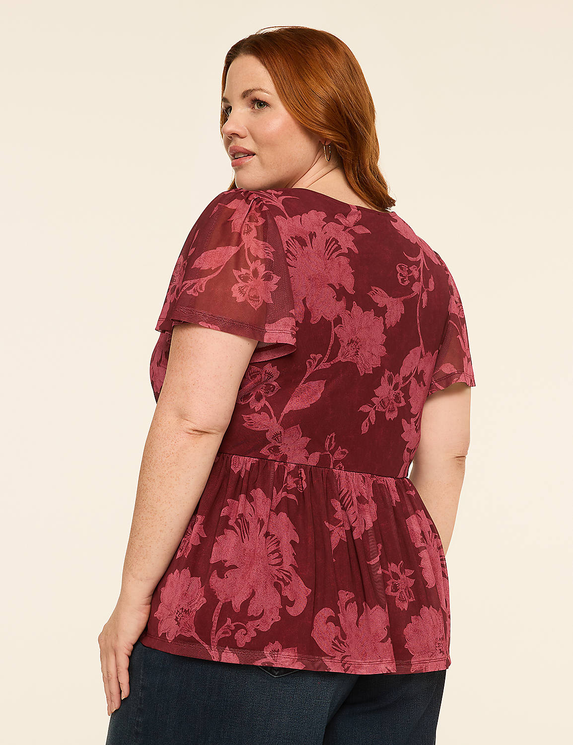 A person wearing dark wash wide-leg jeans stands against a plain, light-colored background. Product Image 2
