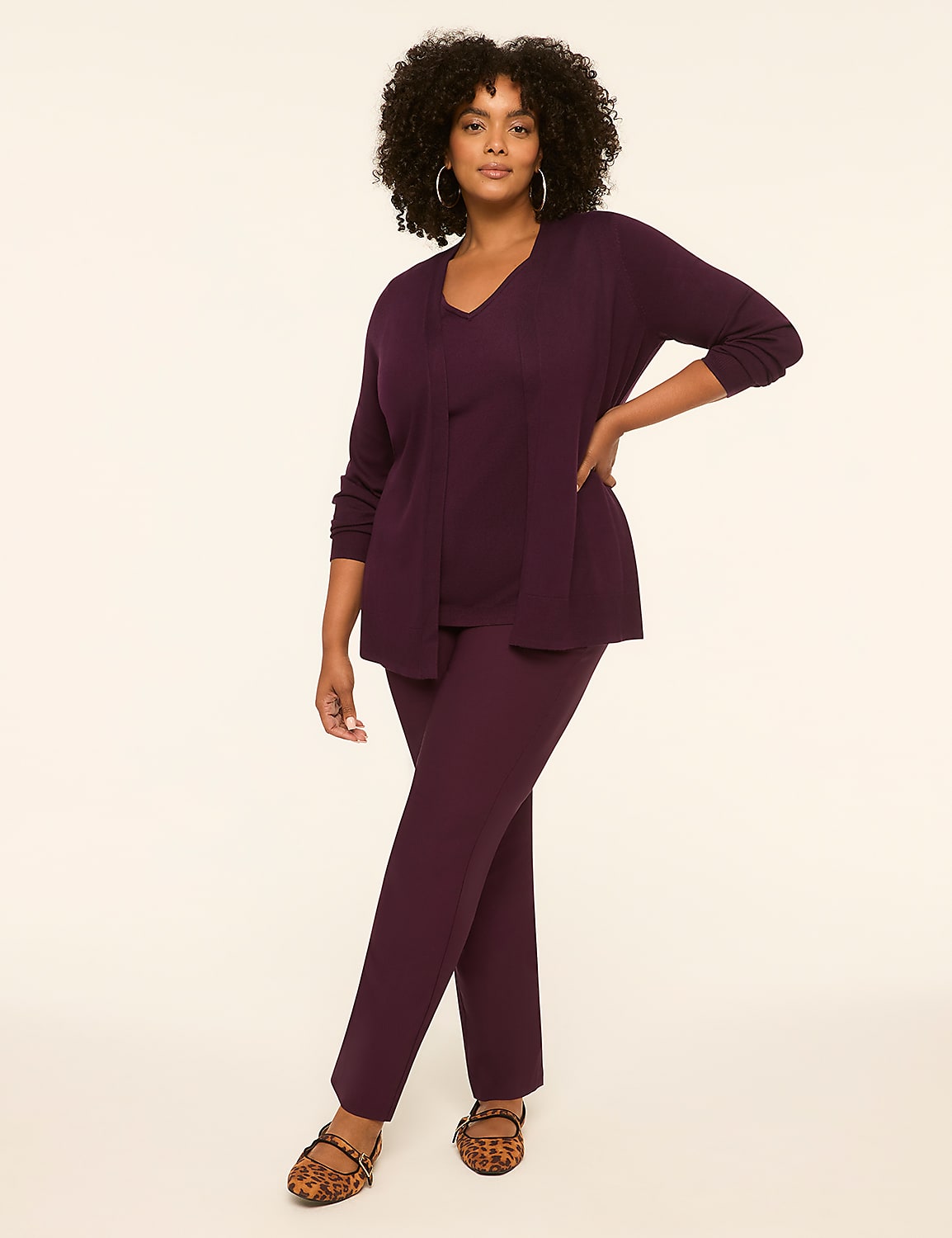 A woman in a plum-colored cardigan, camisole, and pants stands against a plain, light-colored background. Product Image 3