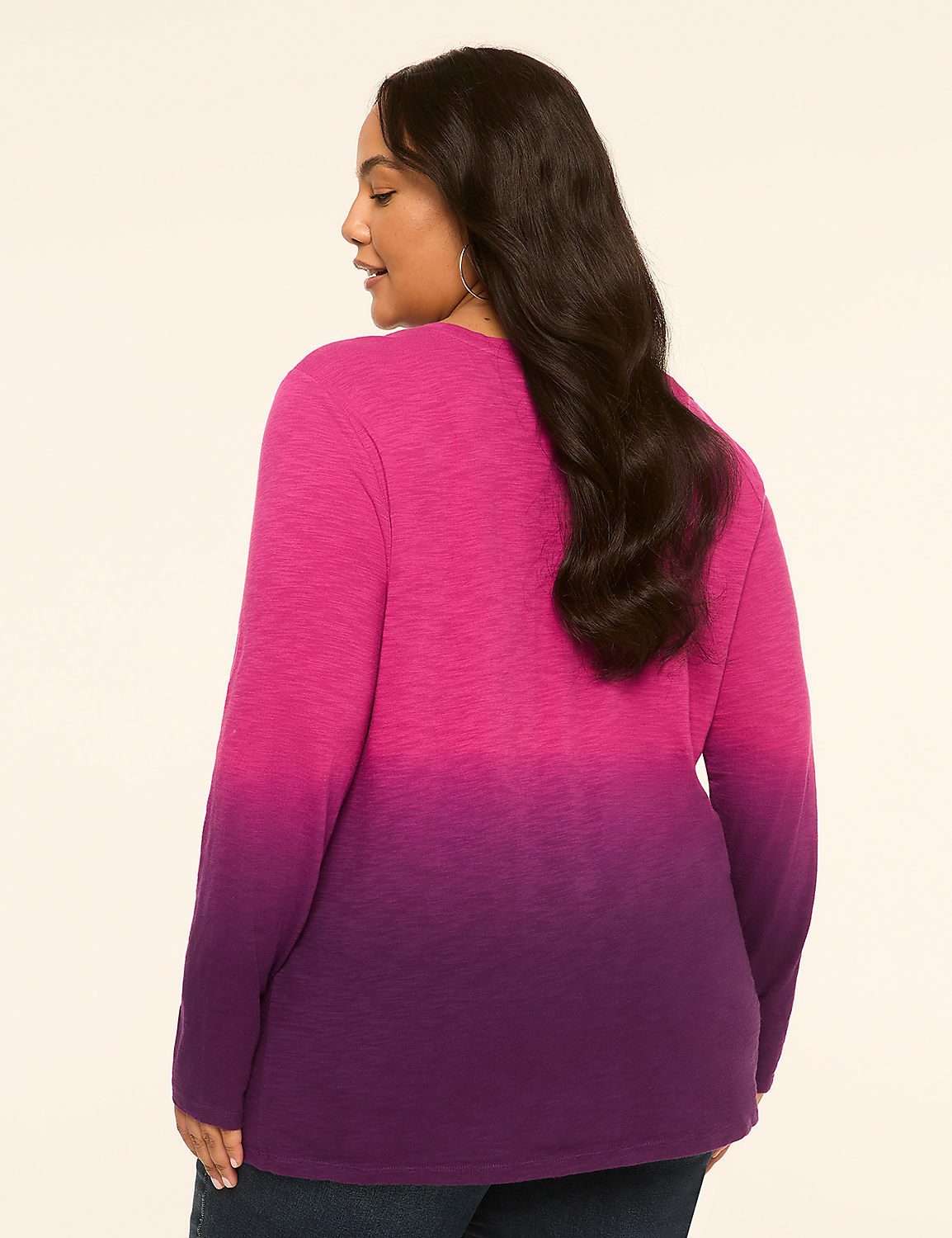 A woman in a pink and purple ombre long-sleeved shirt stands against a plain, light-colored background. Product Image 2