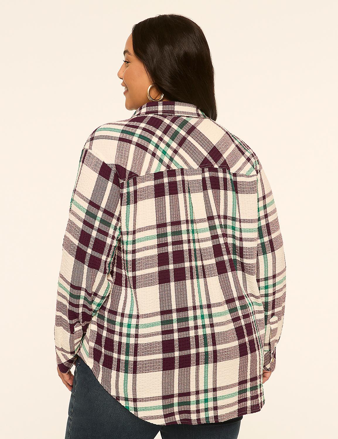 A woman in a plaid shirt stands against a plain, light-colored background. Product Image 2