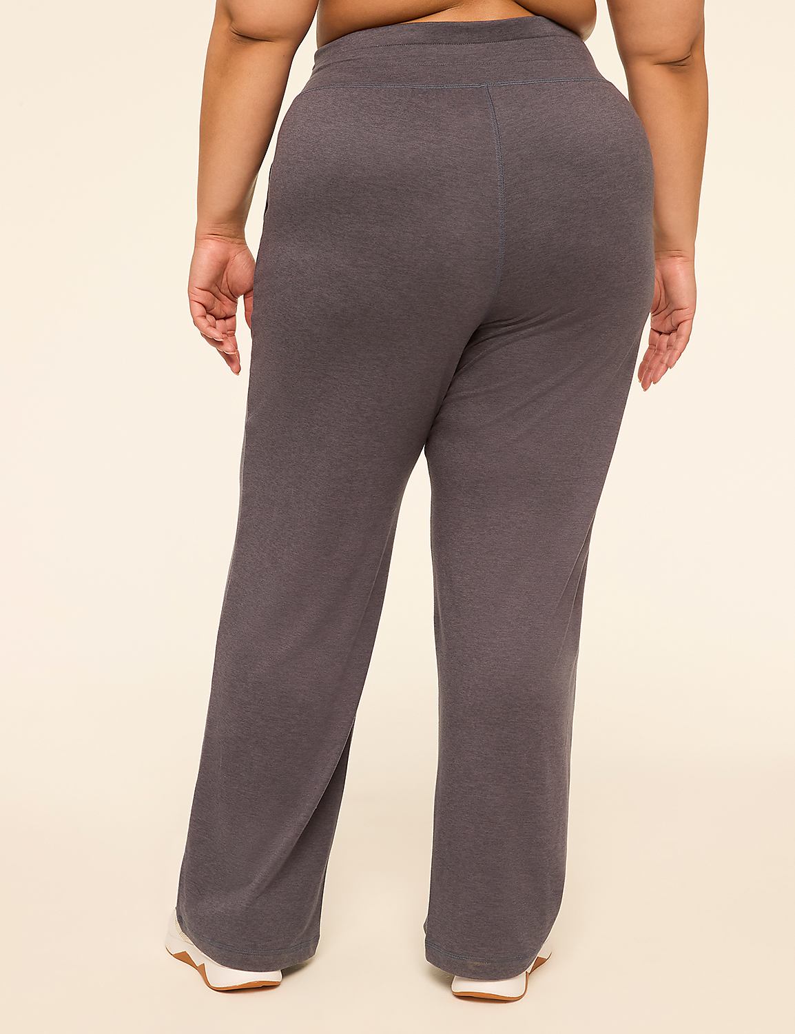 A person wearing dark gray sweatpants stands against a plain, light-colored background. Product Image 2