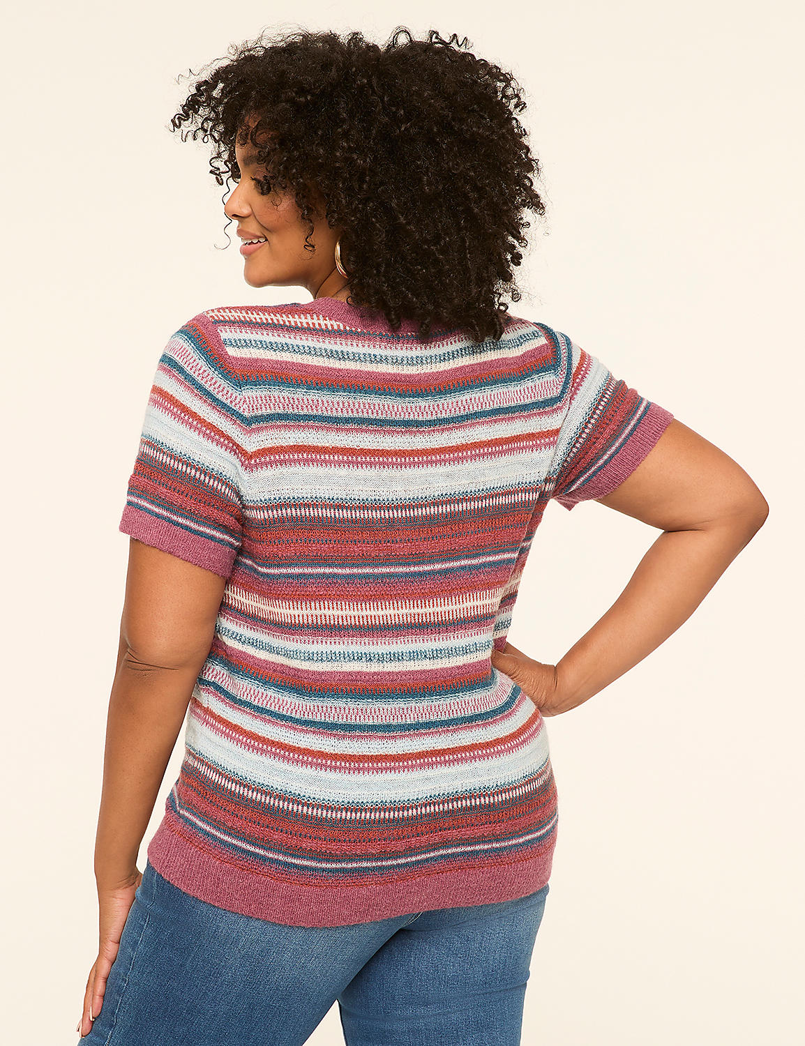 A woman in a striped shirt and jeans stands against a plain, light-colored background. Product Image 2