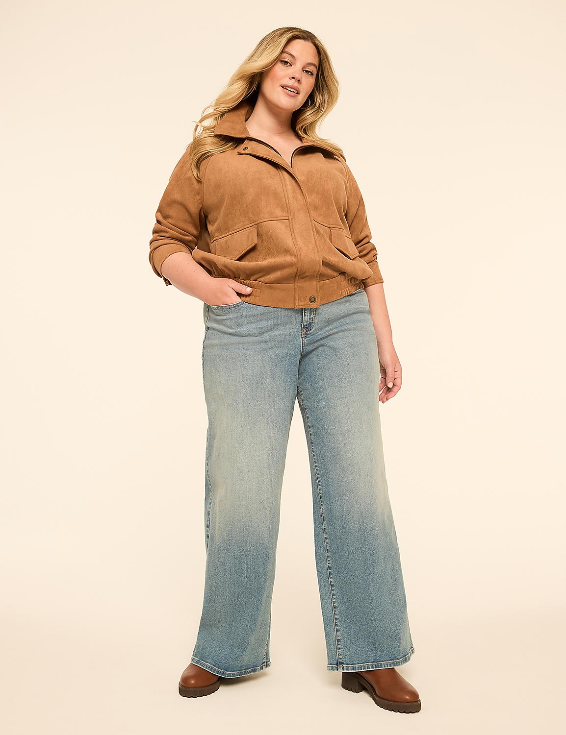 A woman in a brown corduroy jacket and wide-leg jeans stands against a plain, light-colored background. Product Image 3