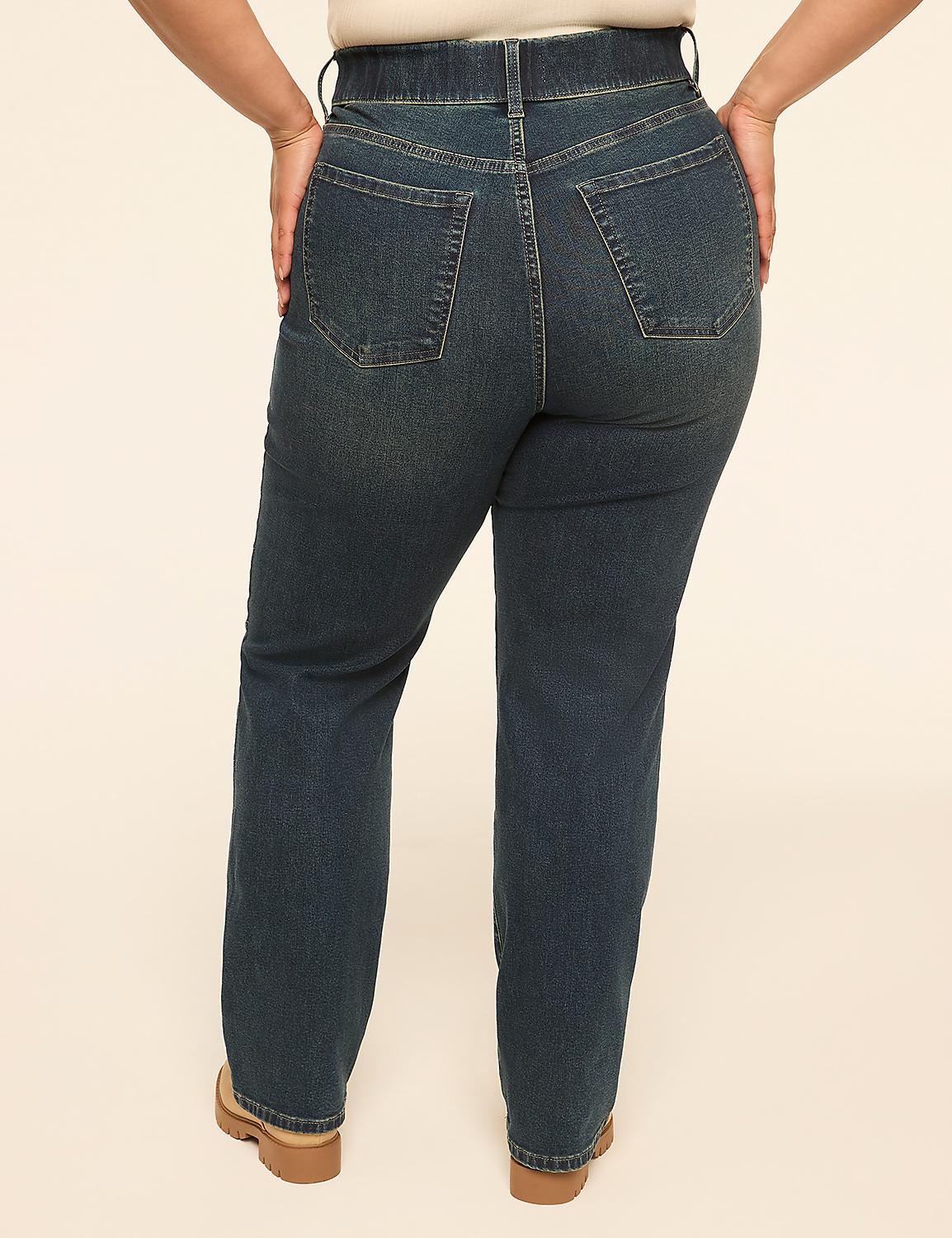 A person wearing dark wash denim jeans stands with their hands on their hips against a plain, light-colored background. Product Image 2