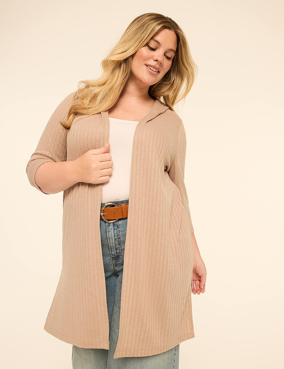 A woman in a beige hooded cardigan and jeans stands against a plain, light-colored background. Product Image 1