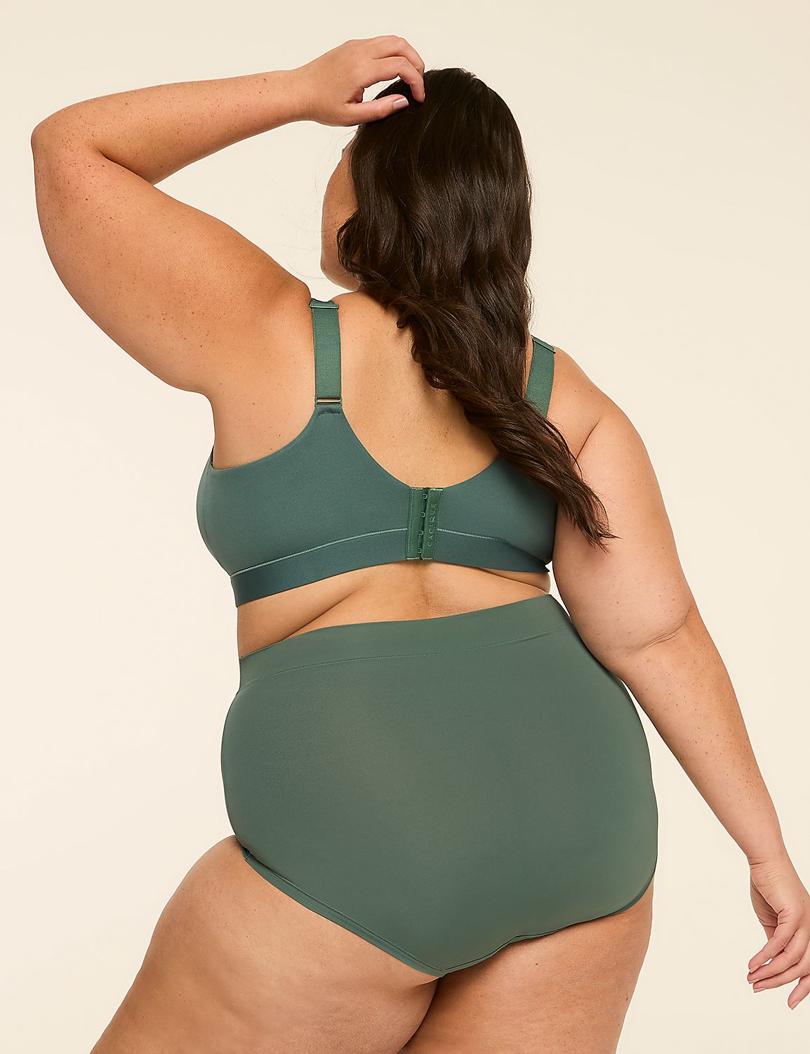A woman in a green bra and underwear stands with her back to the camera against a plain, light-colored background. Product Image 2