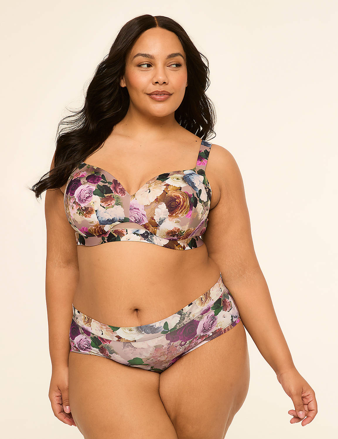 A plus-size woman in a floral bra and underwear stands against a plain, light background. Product Image 4
