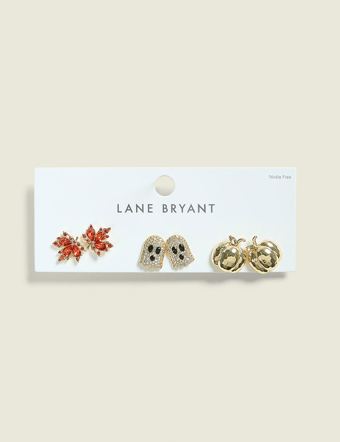 Three pairs of Halloween-themed earrings, including a red leaf, two ghosts, and two pumpkins, are displayed on a white card against a pale beige background. Product Image 1