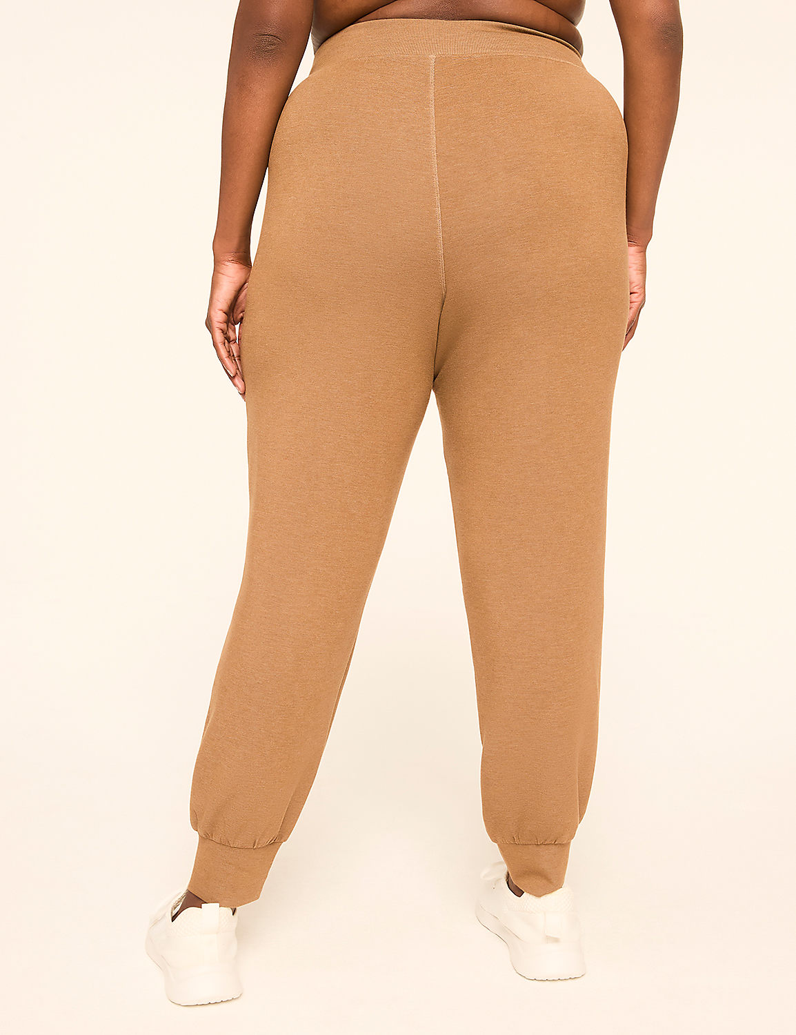 A person wearing tan sweatpants and white sneakers stands against a plain, light-colored background. Product Image 2