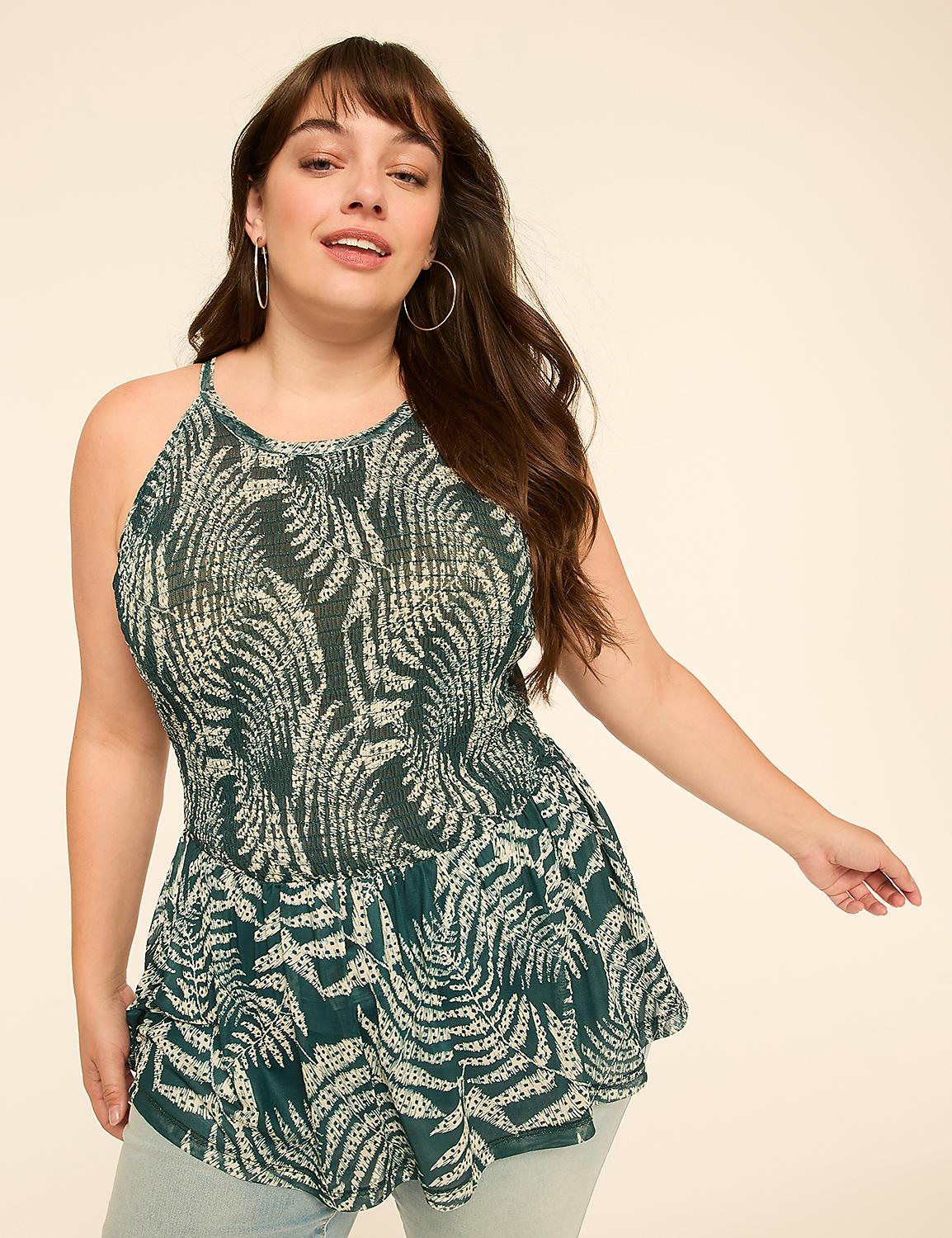 A woman in a patterned halter top poses against a plain, light-colored background. Product Image 1