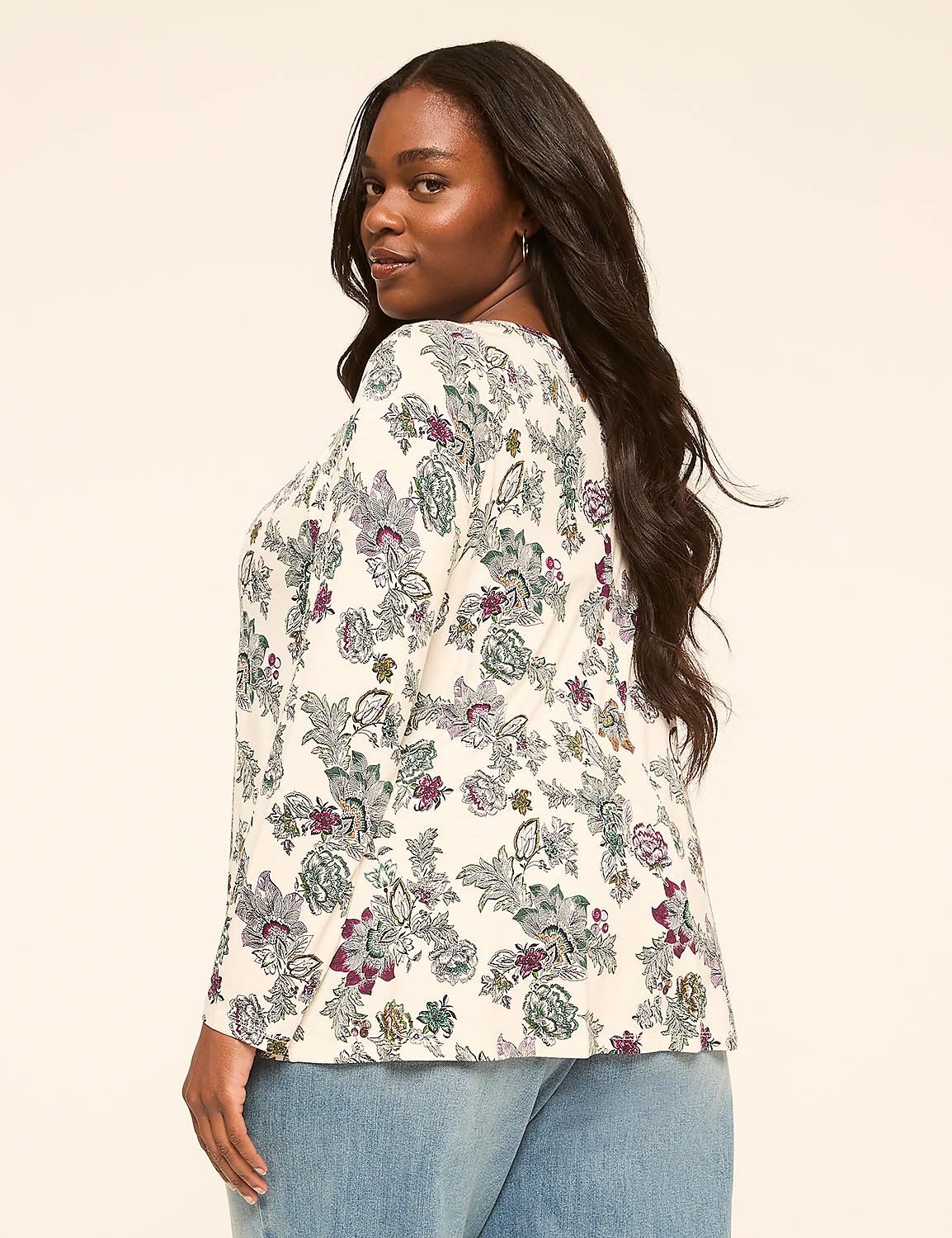 A woman with dark hair and a floral print shirt is shown from the side against a plain, light-colored background. Product Image 2