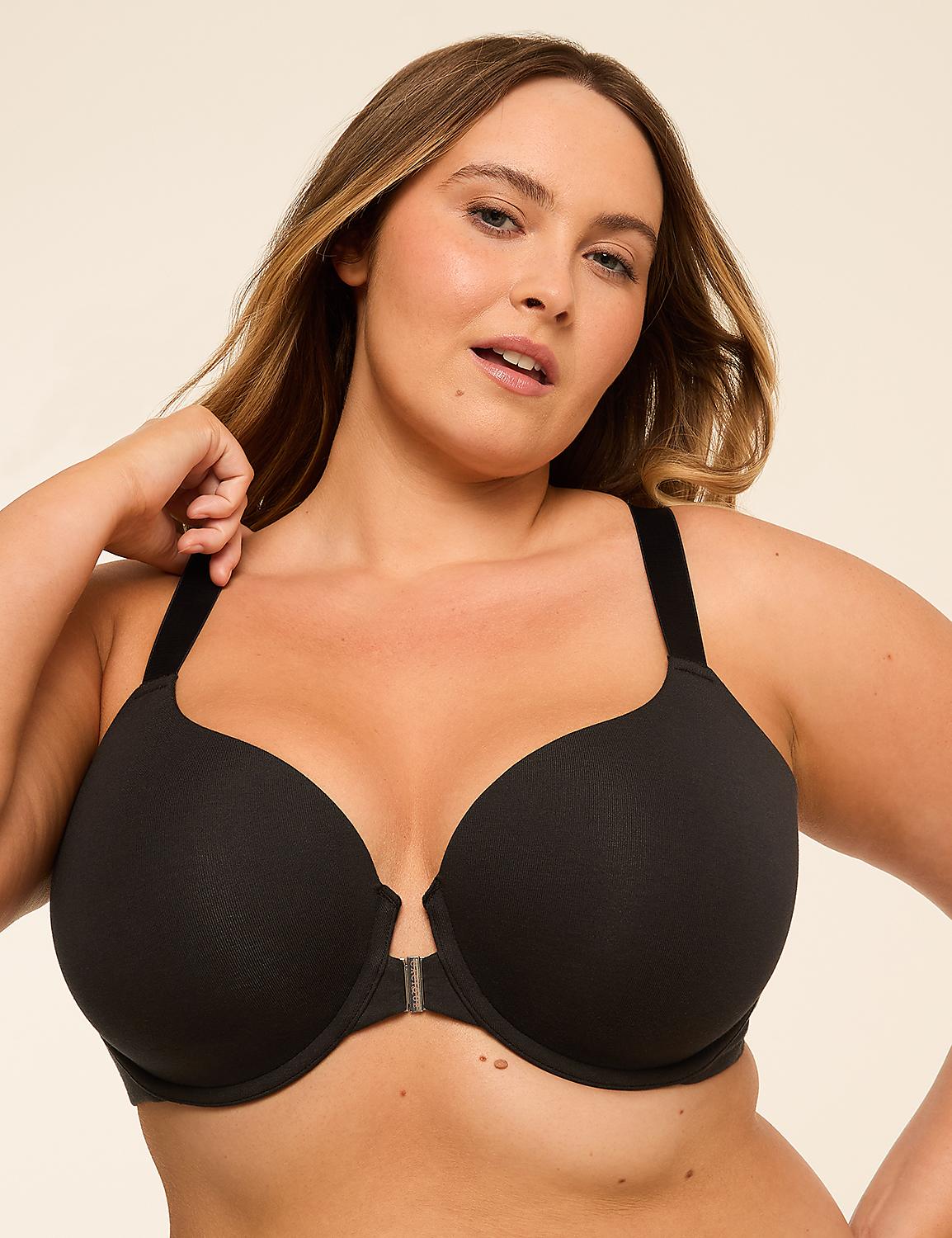 A woman with blonde hair and fair skin poses in a black bra against a plain, light-colored background. Product Image 1