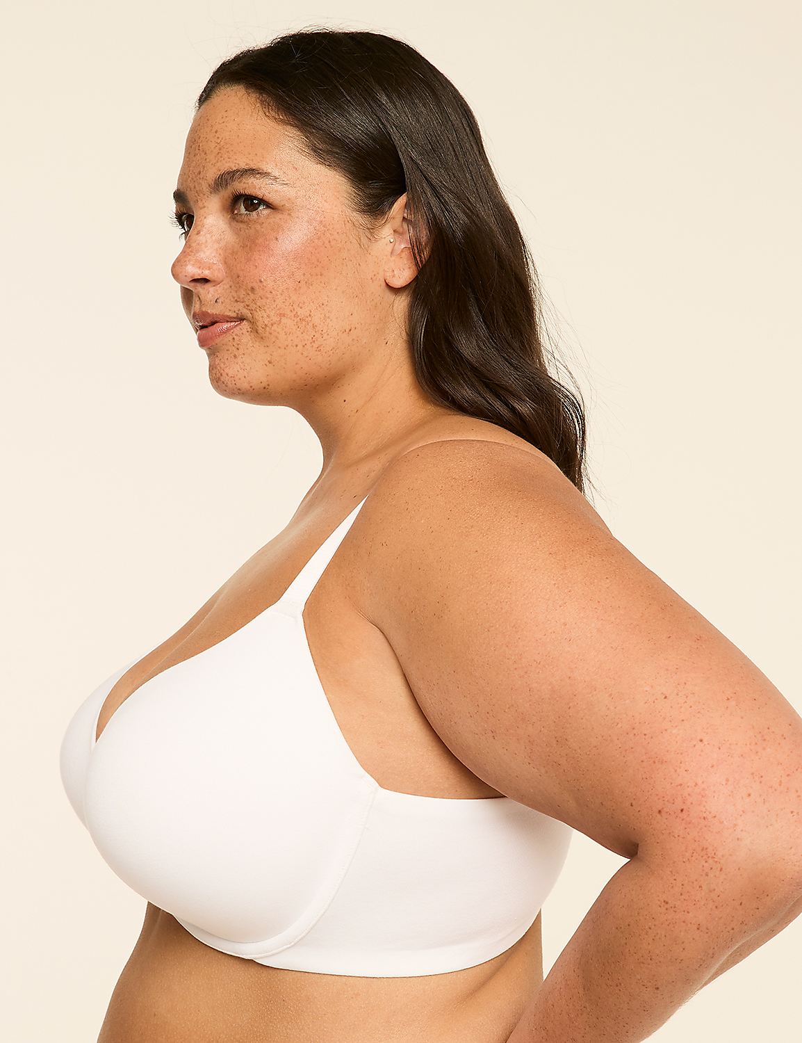 A woman in a white bra is shown in profile against a plain, light background. Product Image 3