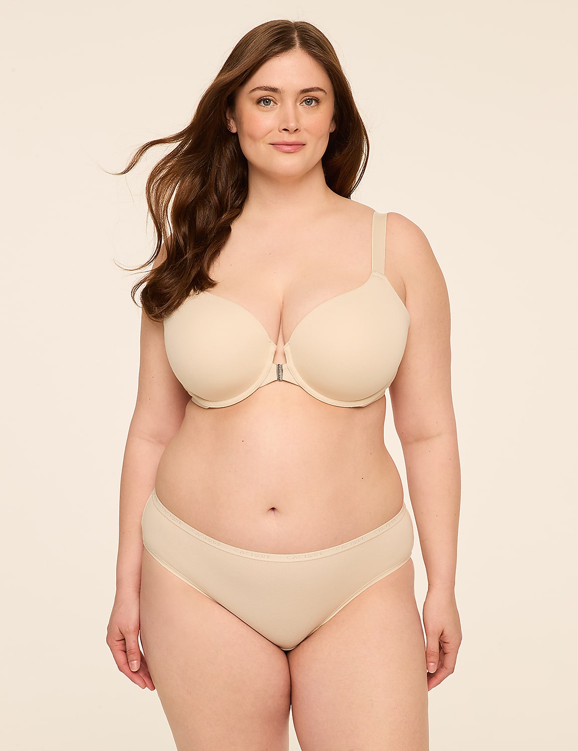 A woman in a beige bra and underwear stands against a plain, light-colored background. Product Image 4