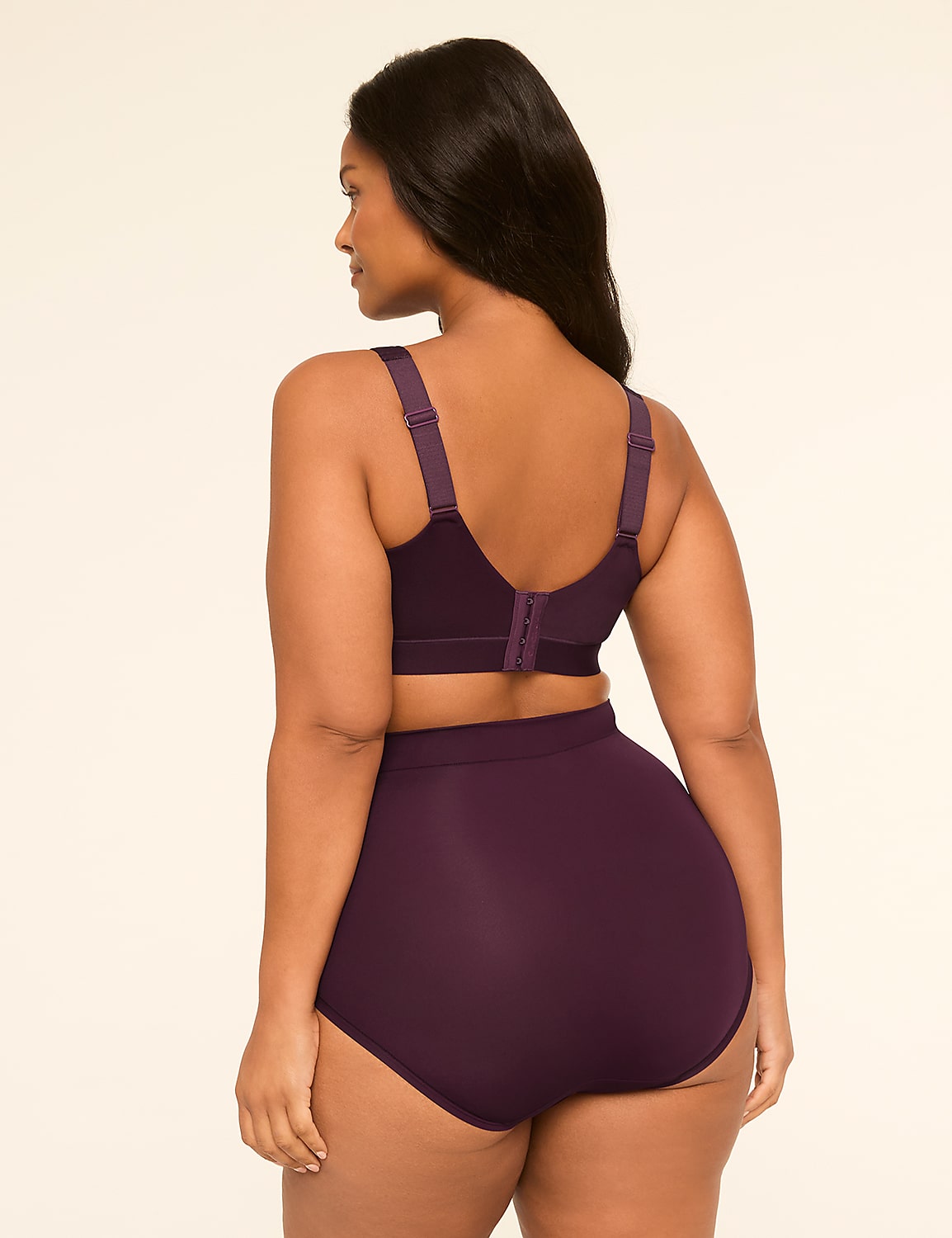 A woman in a plum-colored bra and high-waisted briefs stands against a plain, light background. Product Image 2