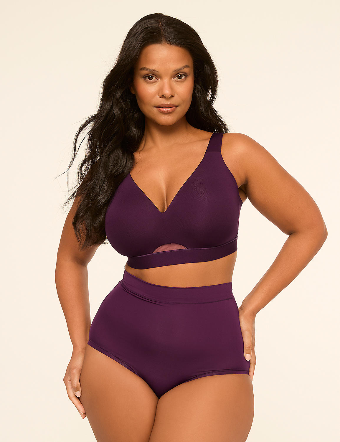 A woman in a purple bra and high-waisted underwear stands against a plain, light background. Product Image 4