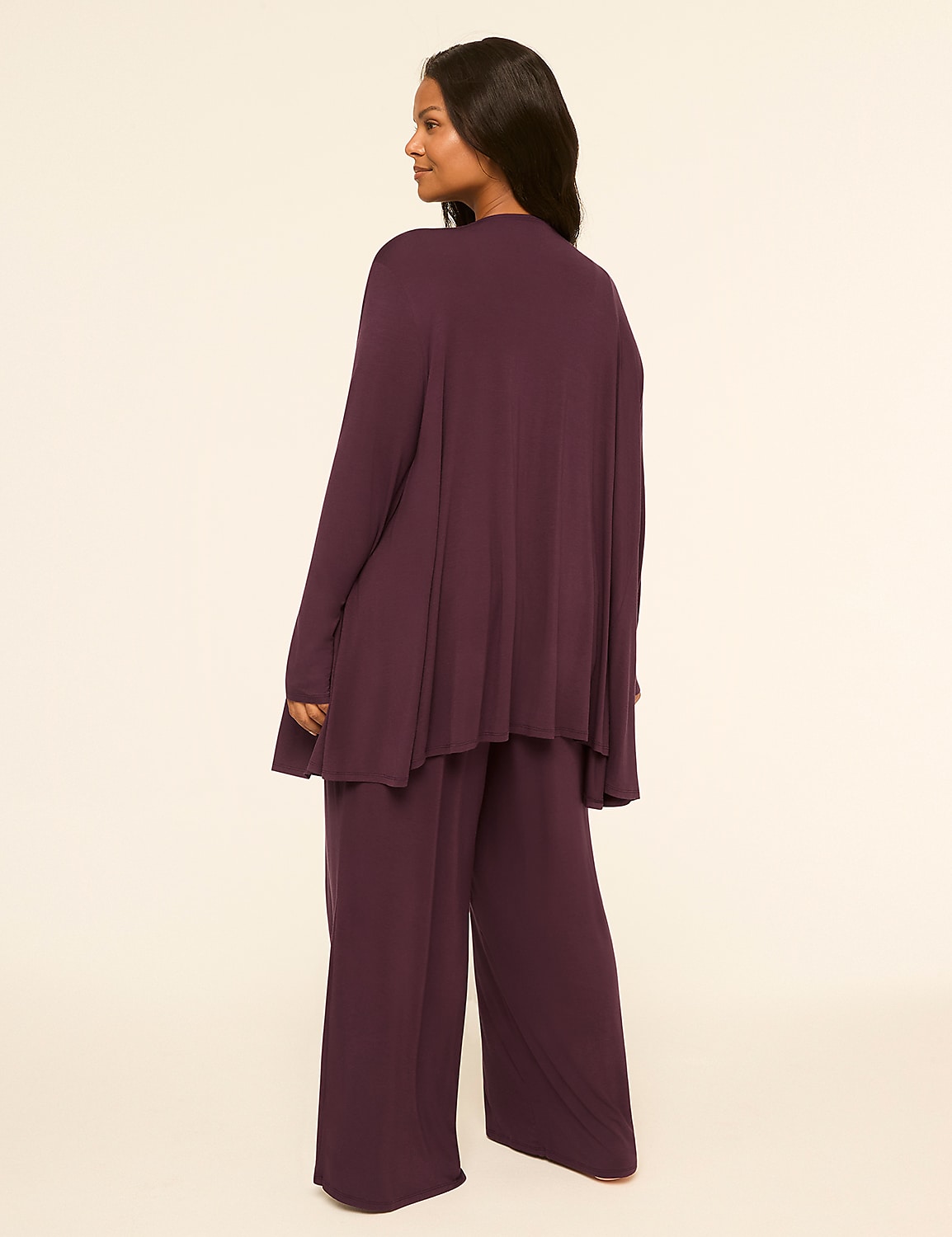 A woman in a plum-colored loungewear set stands against a plain, light-colored background. Product Image 2