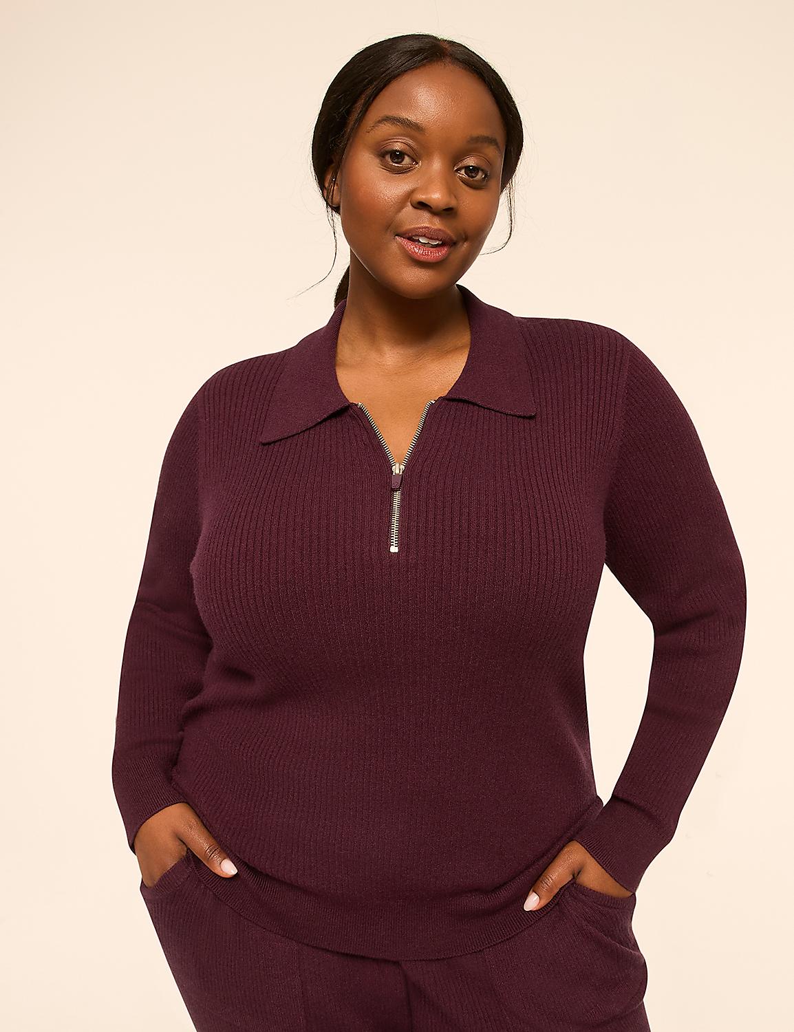 A woman in a burgundy quarter-zip sweater and matching pants stands against a plain, light-colored background. Product Image 1