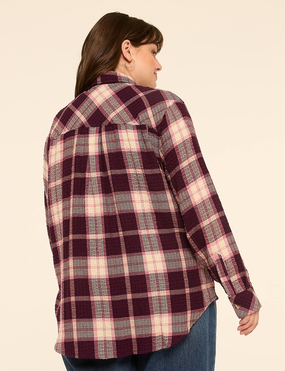 A woman in a purple plaid shirt stands against a plain, light-colored background. Product Image 2