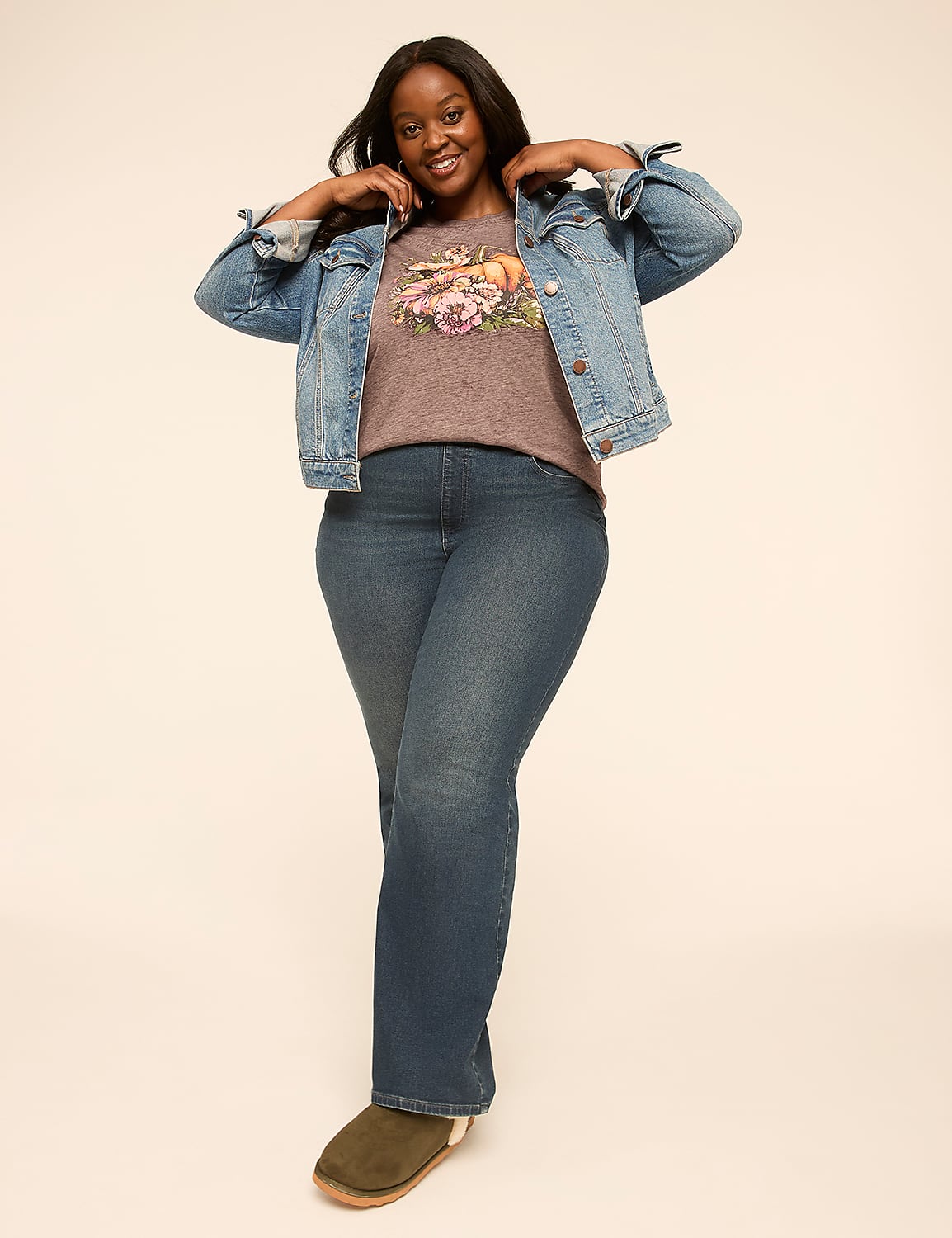 A smiling woman in a denim jacket and jeans stands against a plain, light-colored background. Product Image 3