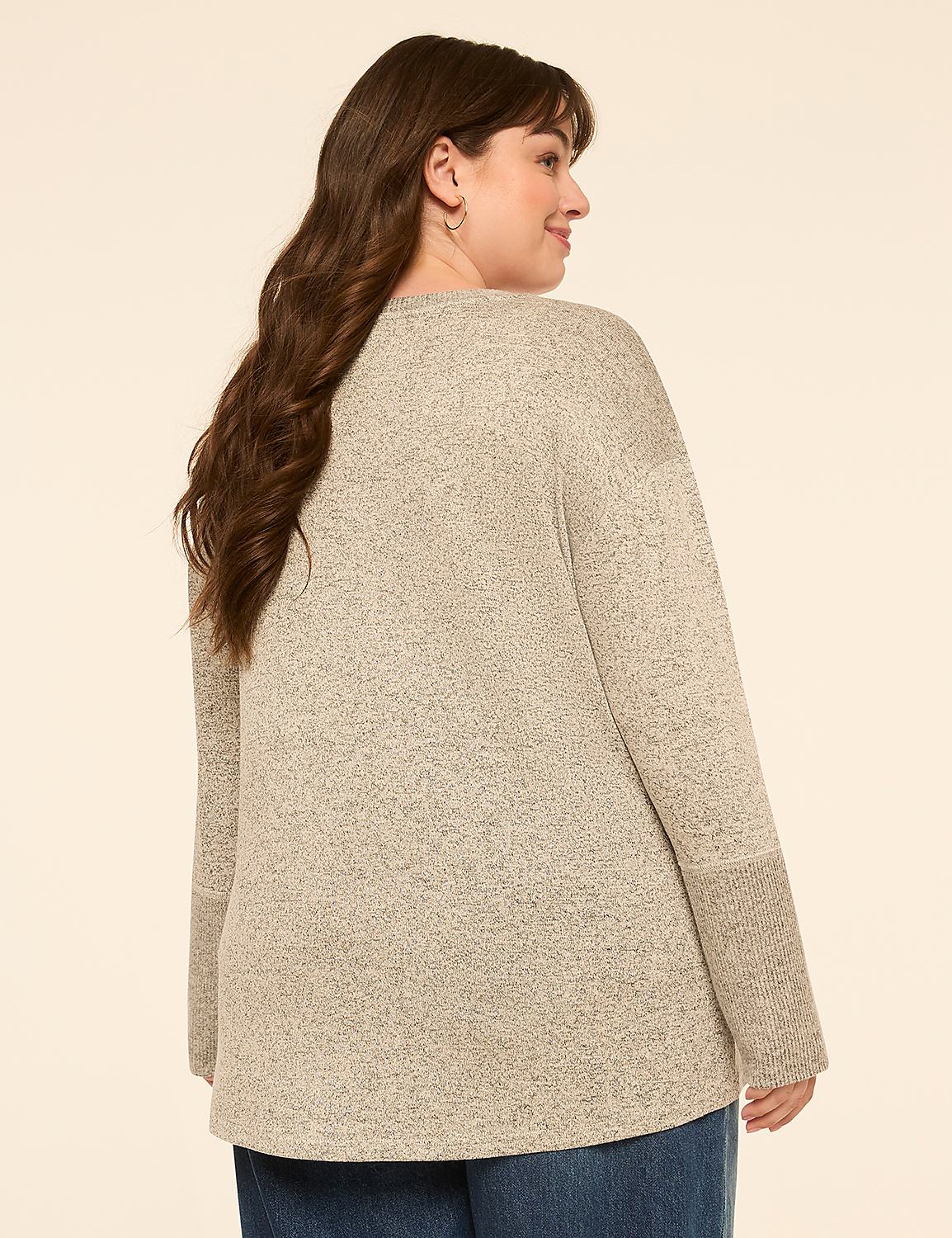 A woman in a heather gray sweater and blue jeans is shown from the back against a plain, light beige background. Product Image 2