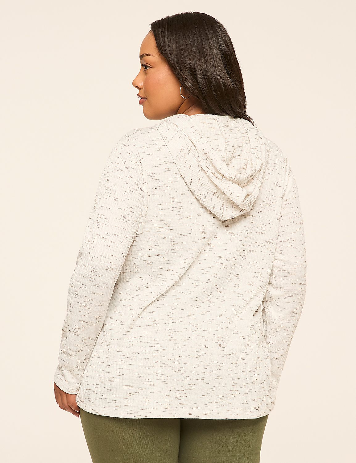 A woman in a speckled white hoodie and olive green leggings stands against a plain, light-colored background. Product Image 2
