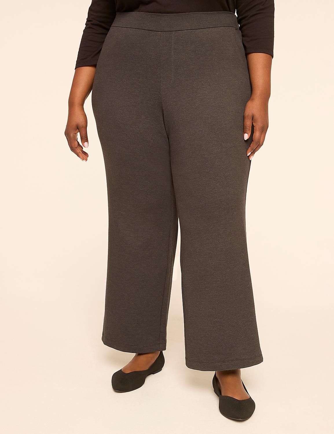 A person stands in dark gray wide-leg pants and black ballet flats against a plain, light-colored background. Product Image 1