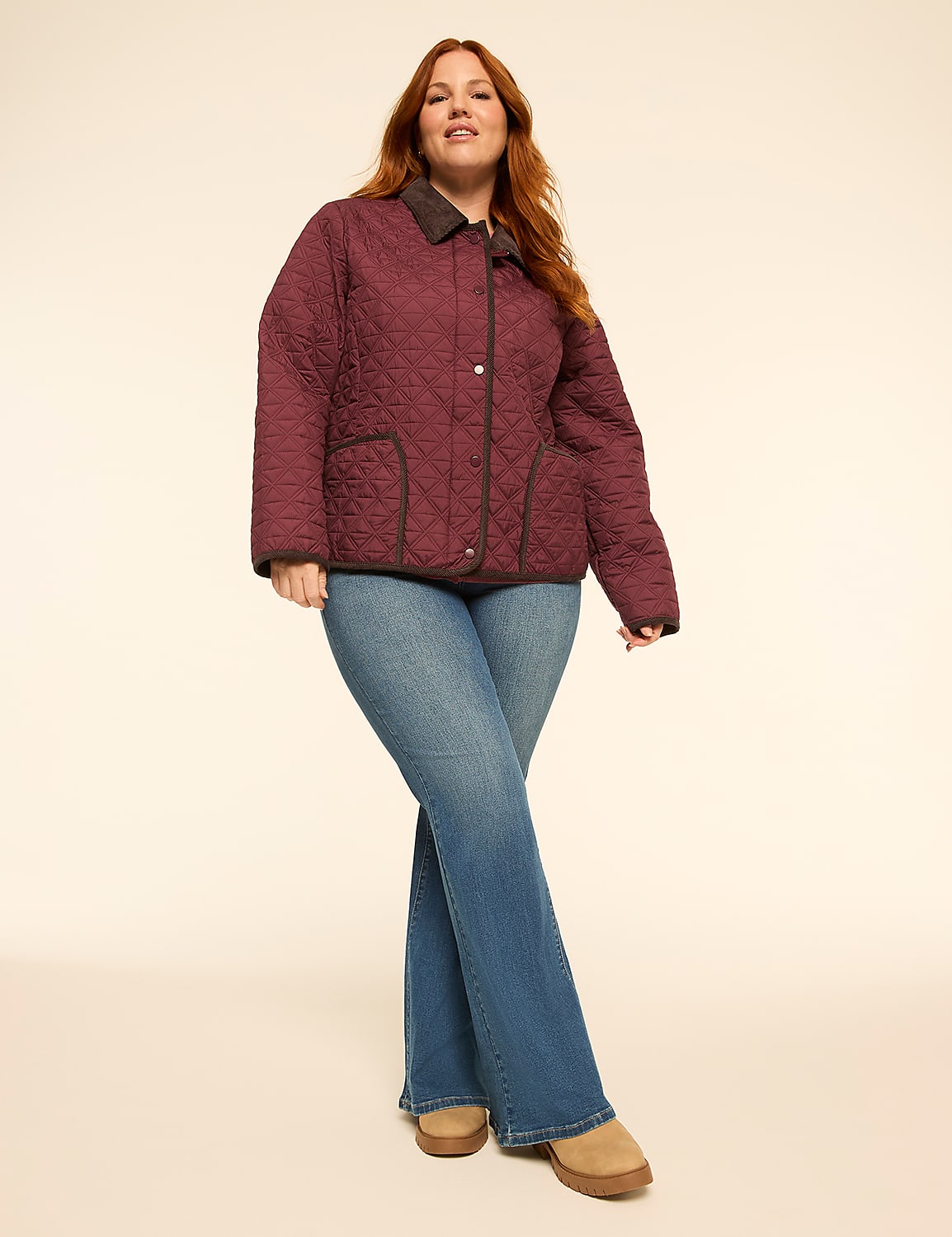 A woman in a quilted maroon jacket and flared jeans stands against a plain, light-colored background. Product Image 3