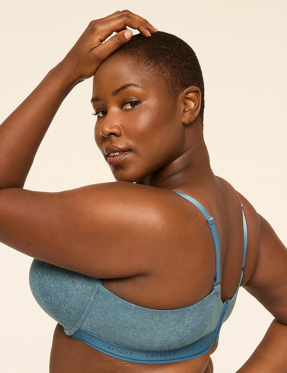 A woman with short hair poses in a blue bra against a plain background. Product Image 3