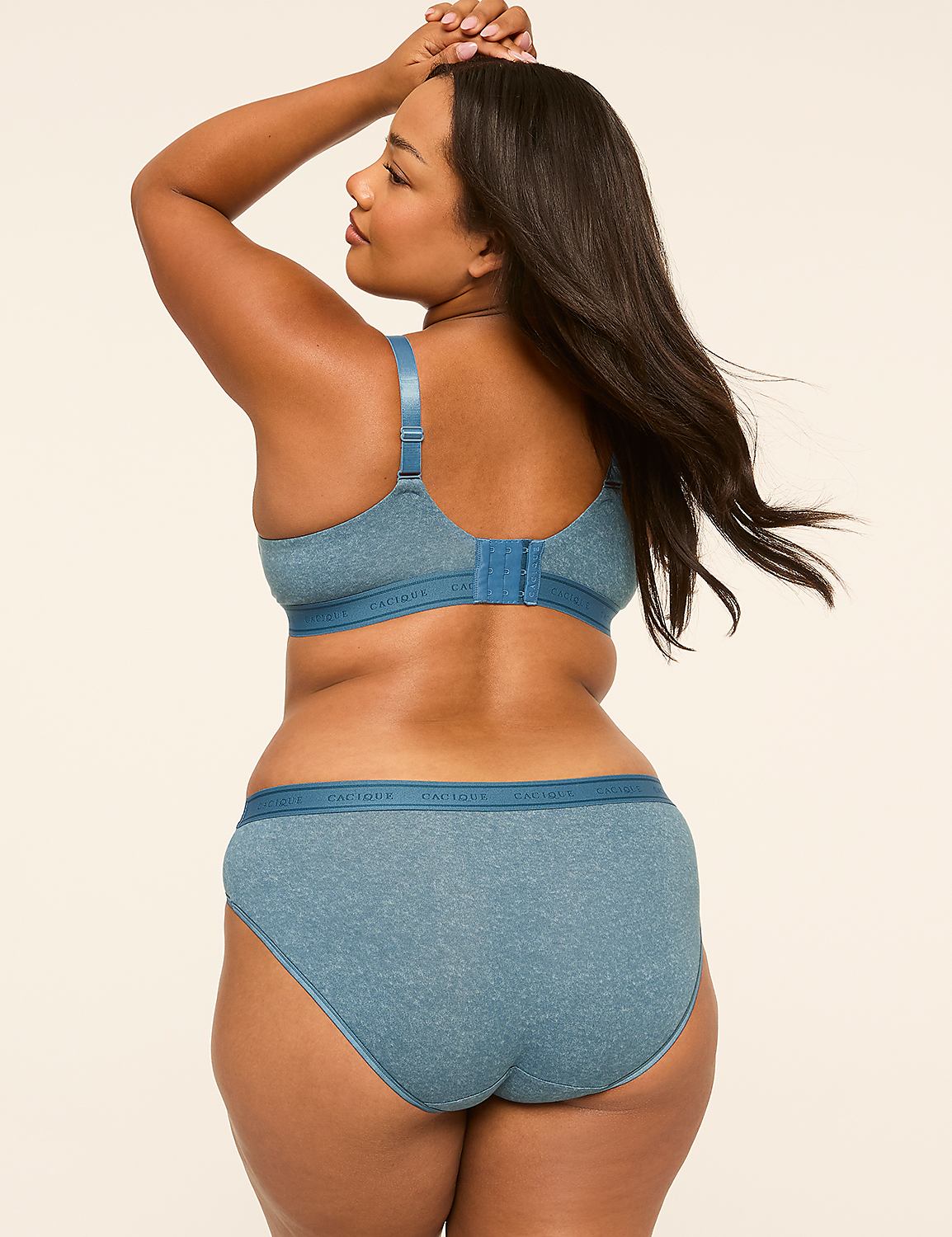 A woman in blue lingerie stands with her back to the camera against a plain, light-colored background. Product Image 2