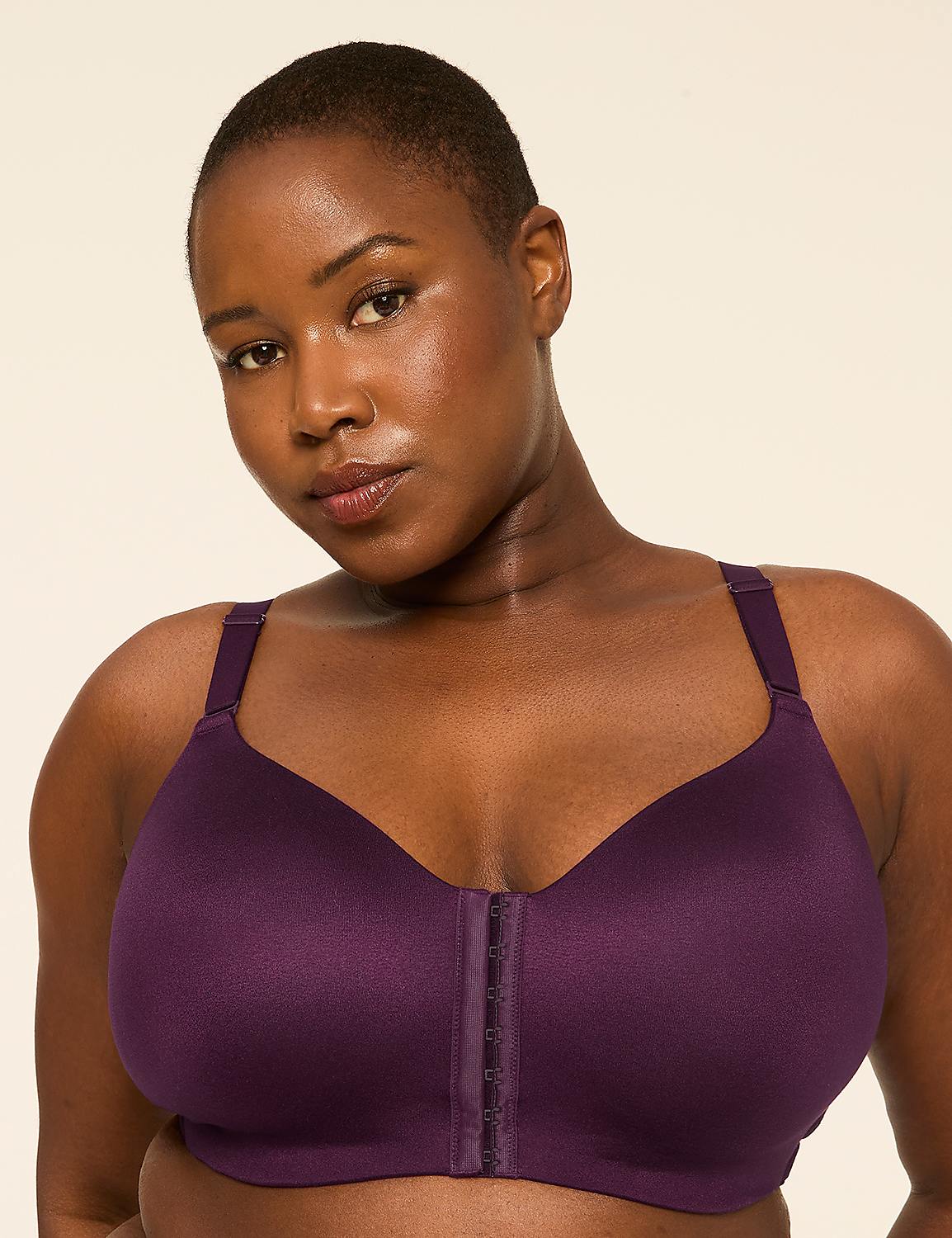 A woman with dark skin and short hair wears a purple bra with a front closure, set against a plain, light-colored background. Product Image 1