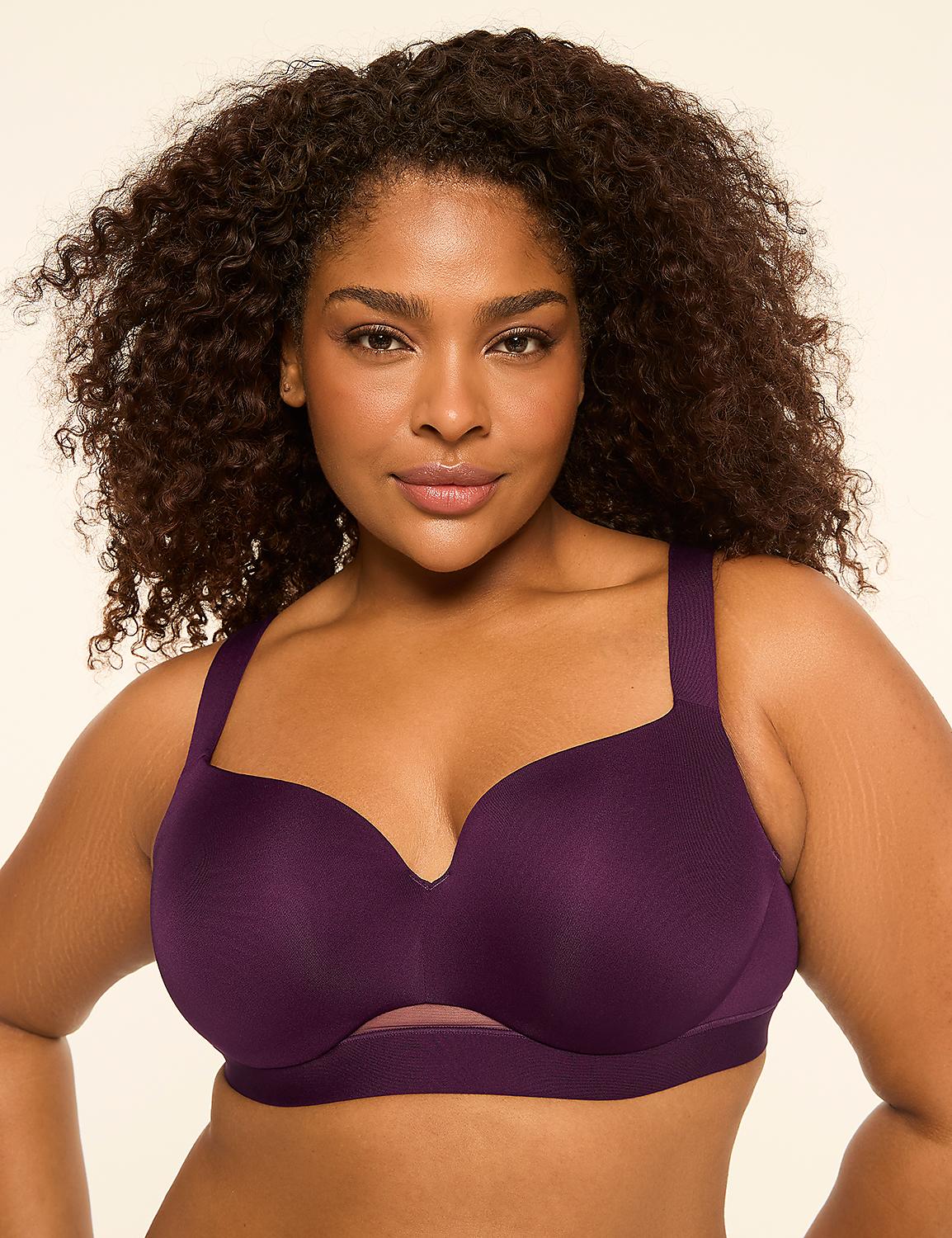 A woman with curly dark hair and a purple bra is centered against a plain, light-colored background. Product Image 1