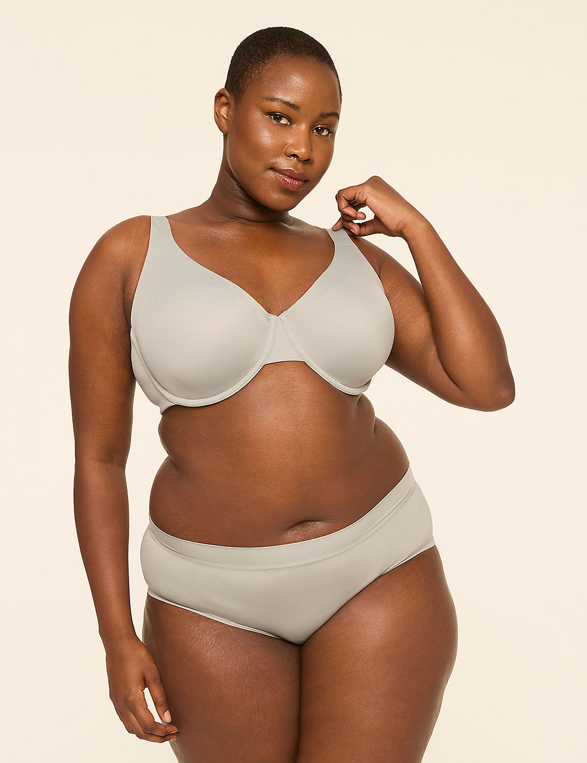 A woman in a light gray bra and underwear stands against a plain, light-colored background. Product Image 4
