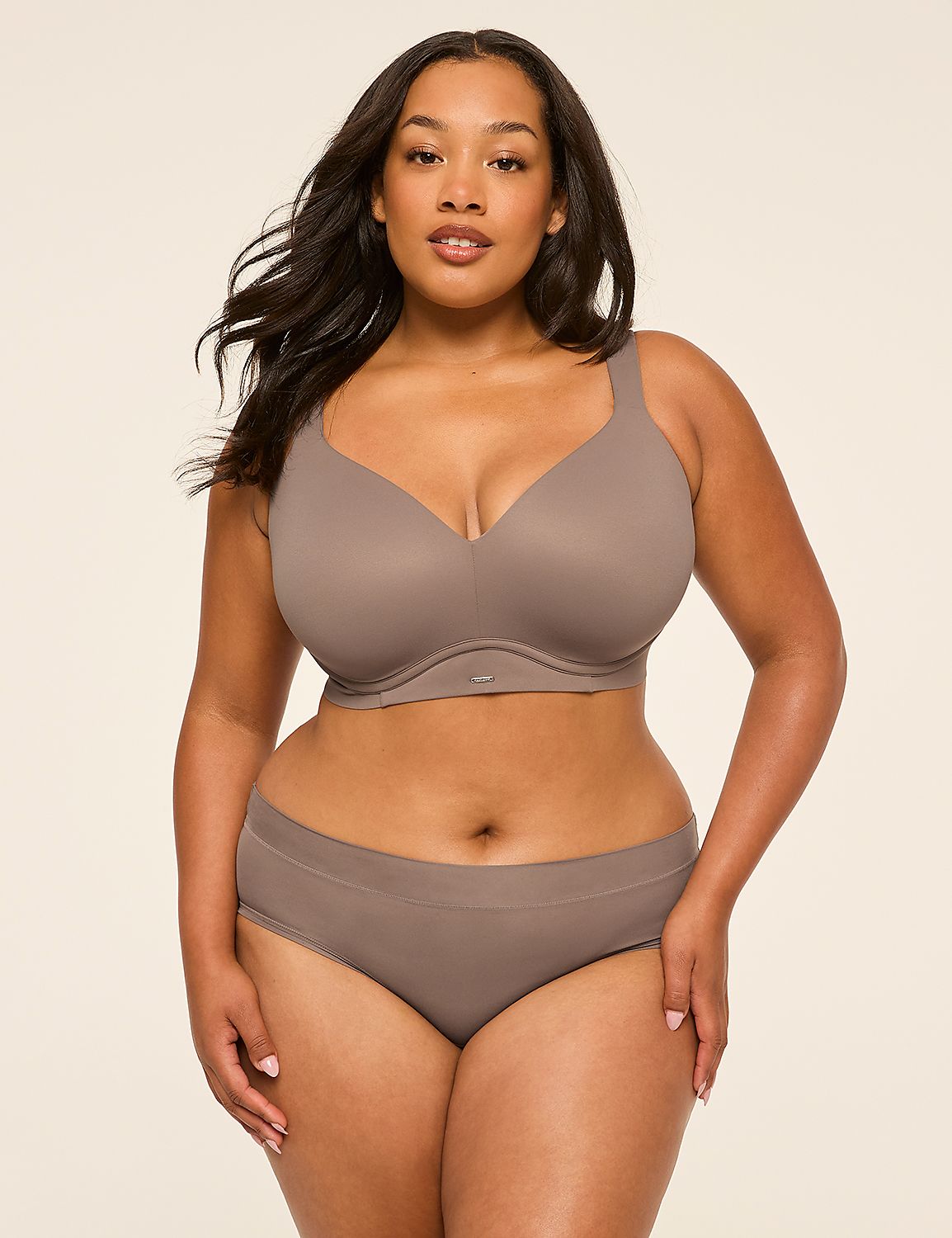 A woman in a taupe bra and underwear stands against a plain, light-colored background. Product Image 4