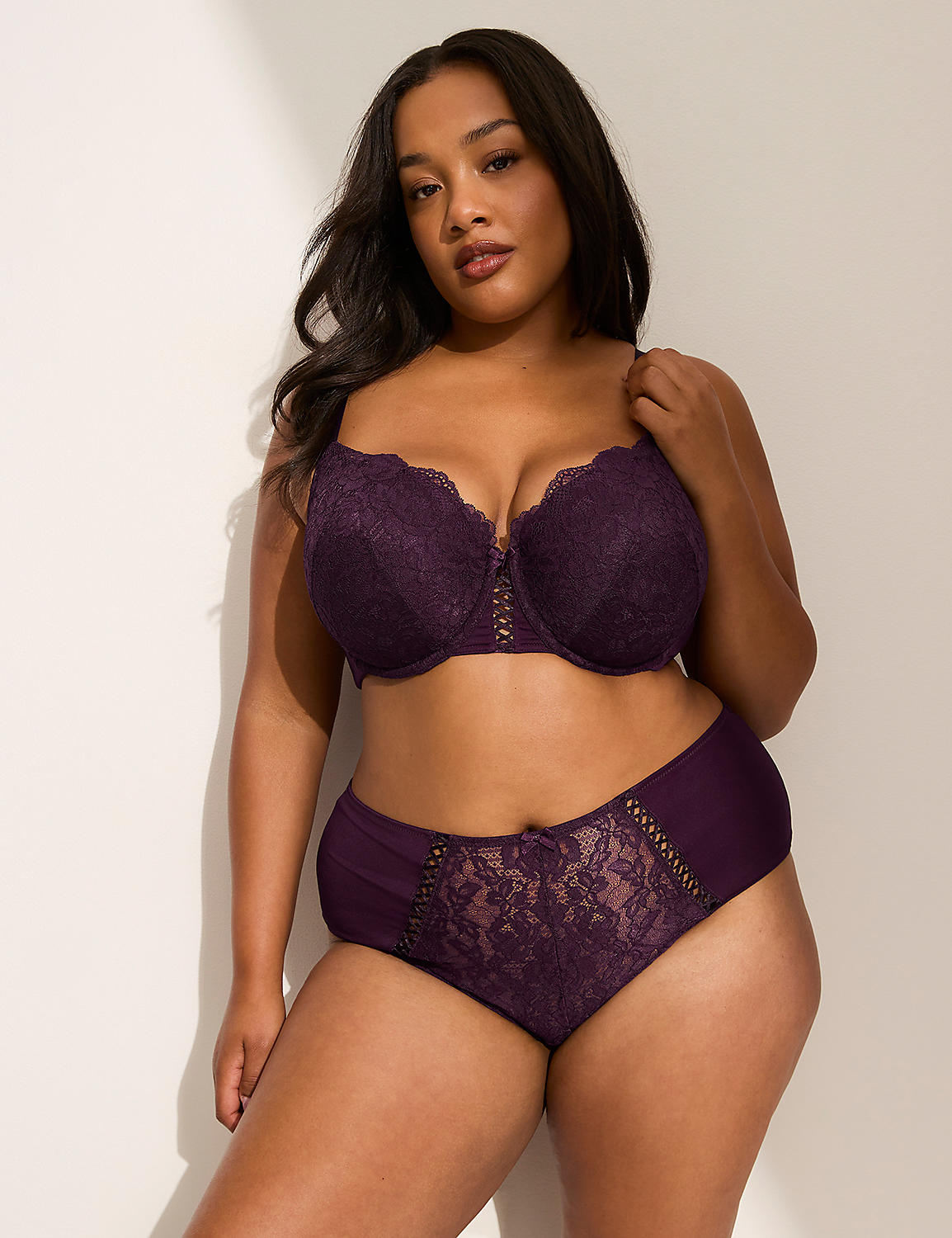 A plus-size woman in a purple lace bra and matching high-waisted underwear stands against a plain white background. Product Image 4
