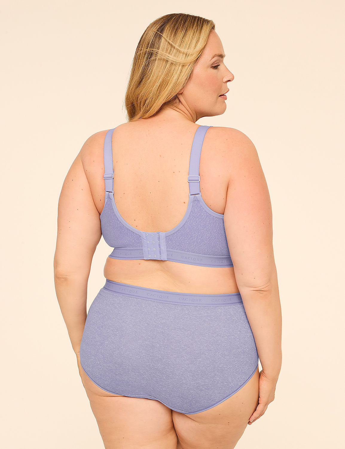 A woman in a light purple bra and underwear stands facing away from the camera against a plain, light-colored background. Product Image 2