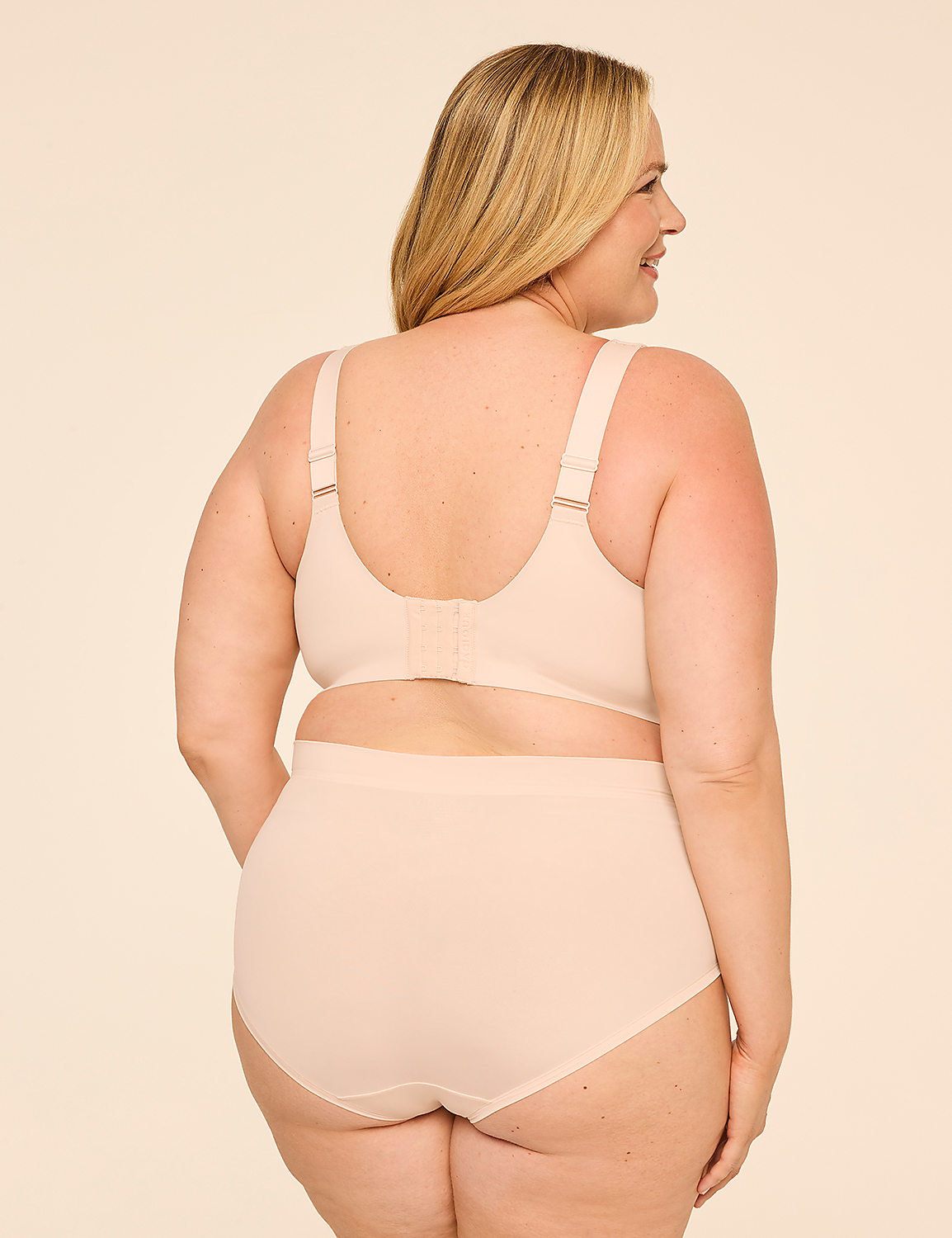 A woman in beige lingerie stands against a plain, light-colored background. Product Image 2